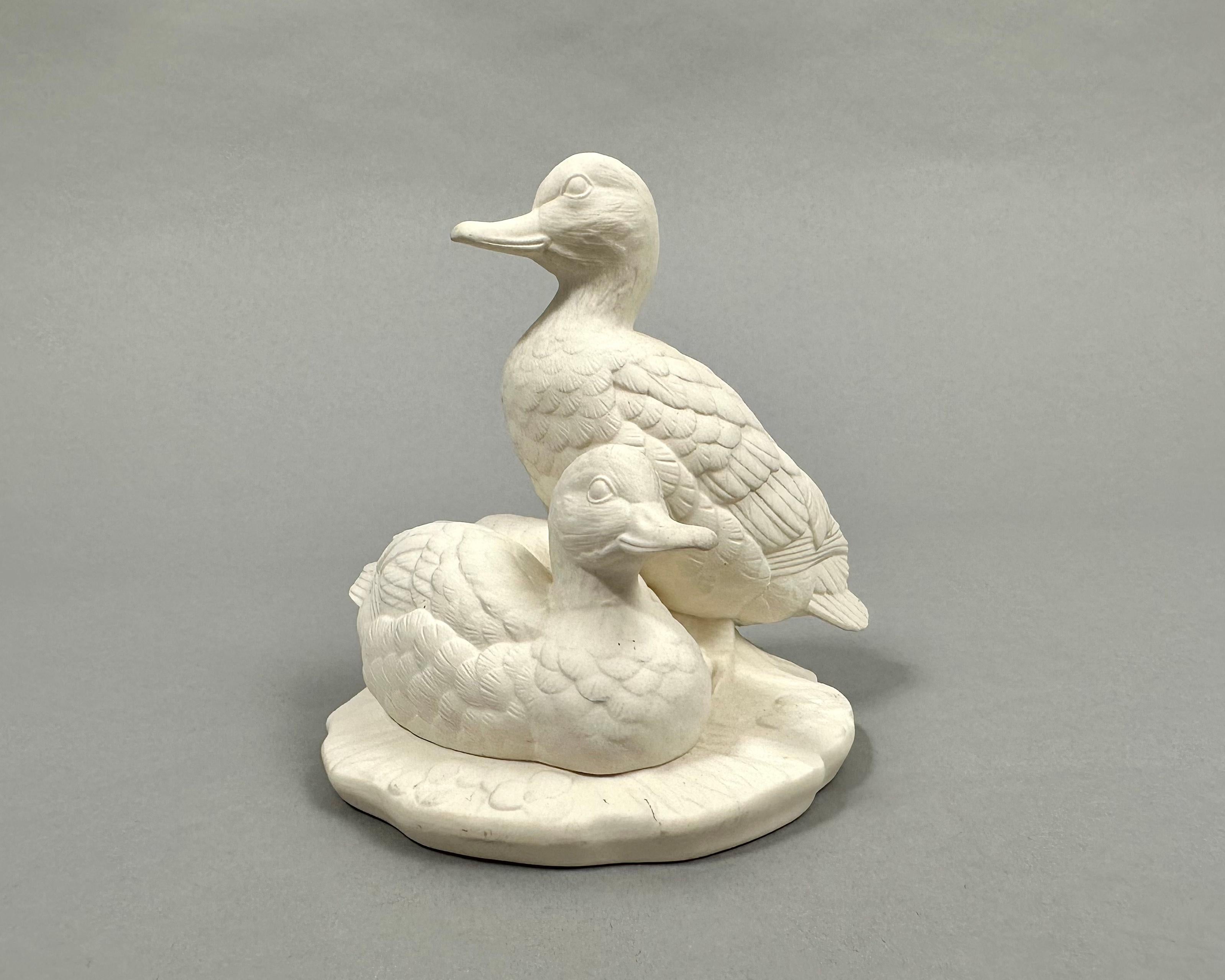 The highly detailed German white porcelain figurine Ducks by GOEBEL - Germany, 1960s.

Very rare and outstanding hard-to-find figurine. It has the finest detail.

Skillfully traced details, completely handmade.

Stamped on the bottom.

The figurine