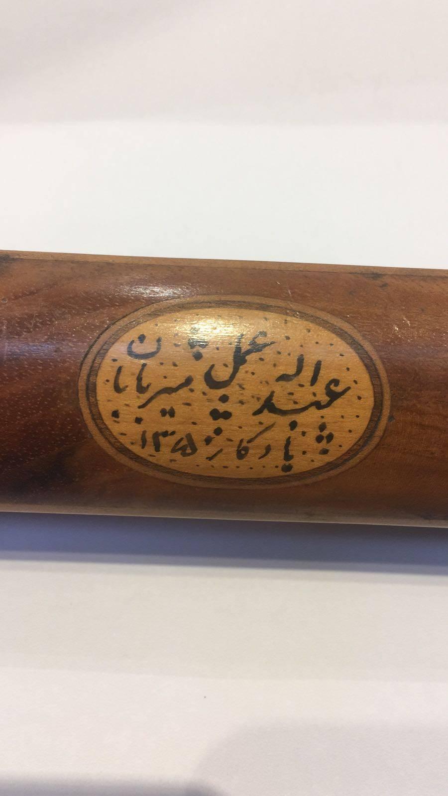 A lovely Qajar paper mâché Royal Pen-box

Measures: H 3.5cm x 21cm.