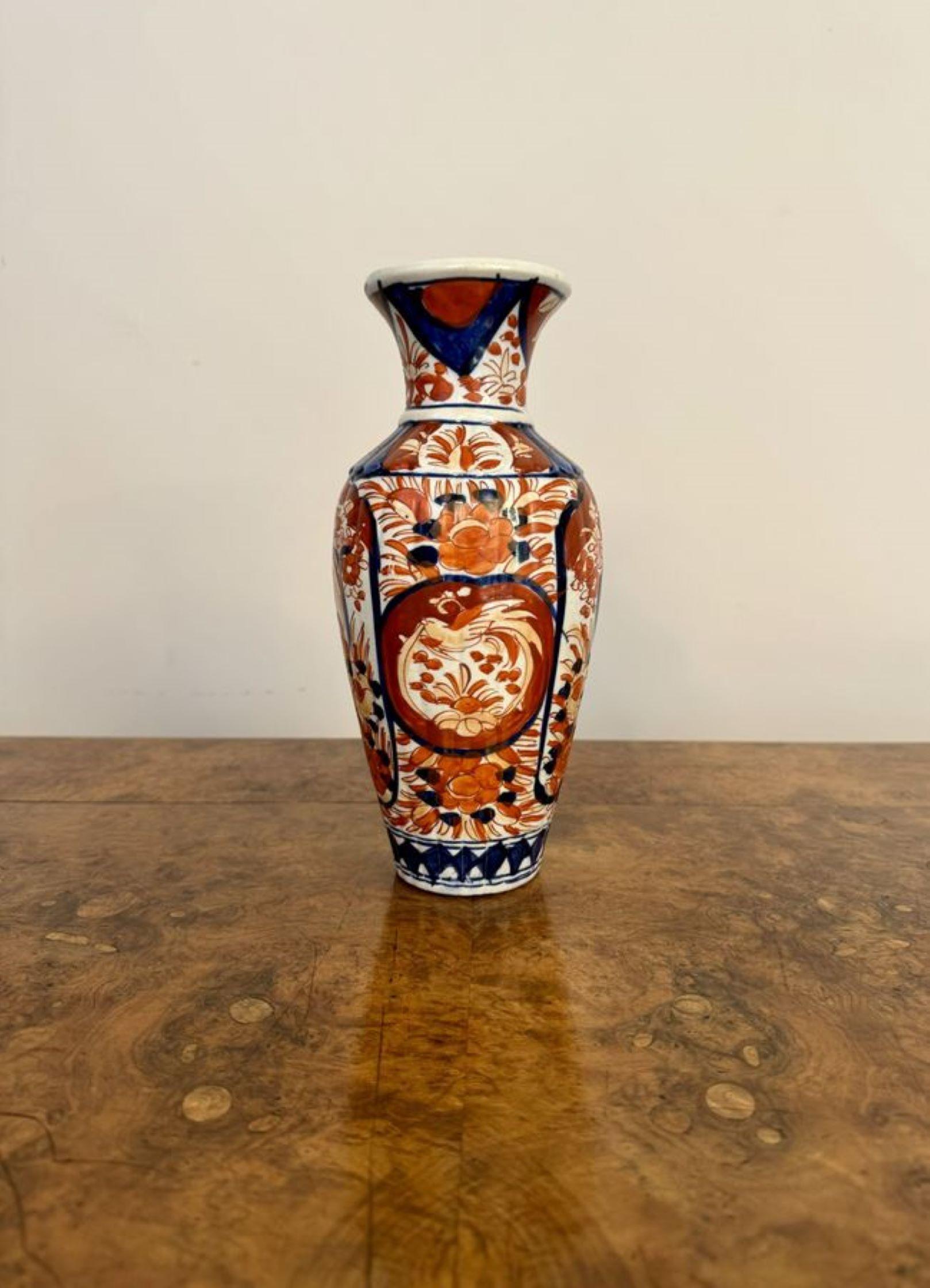 Lovely quality antique Japanese imari vase, having a quality antique Japanese imari shaped vase decorated with trees, flowers, leaves and scrolls hand painted in wonderful red, blue and white colours.

D. 1900