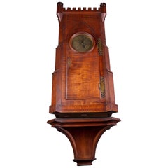 Arts and Crafts Oak Bracket Clock with Brass Dial with castellated turrets