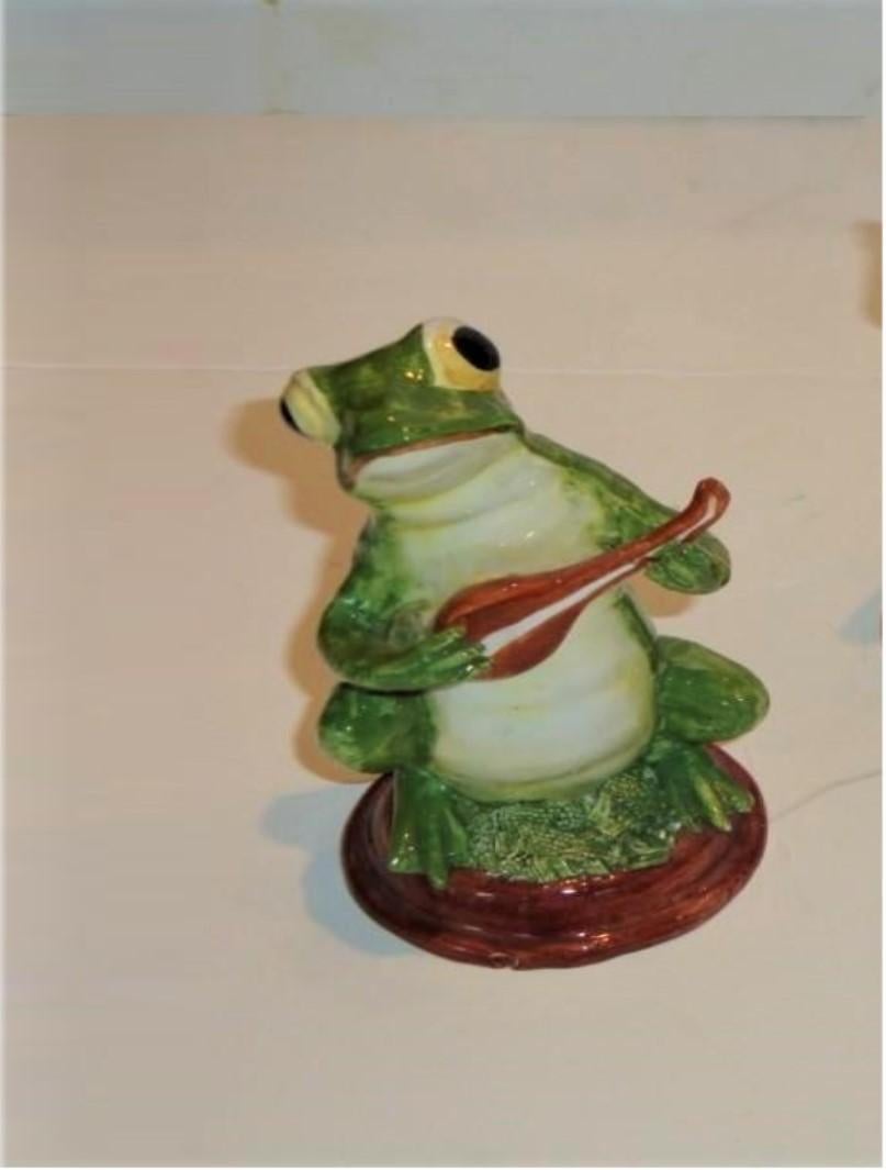 The Following Items we are offering are a Rare Beautiful Estate Three Piece Set of a Trio Musical Group of Frogs playing Musical Instruments, Each signed Italy!!! Beautifully done in the Finest Quality and Detail. In Great Condition.

Taken out of a