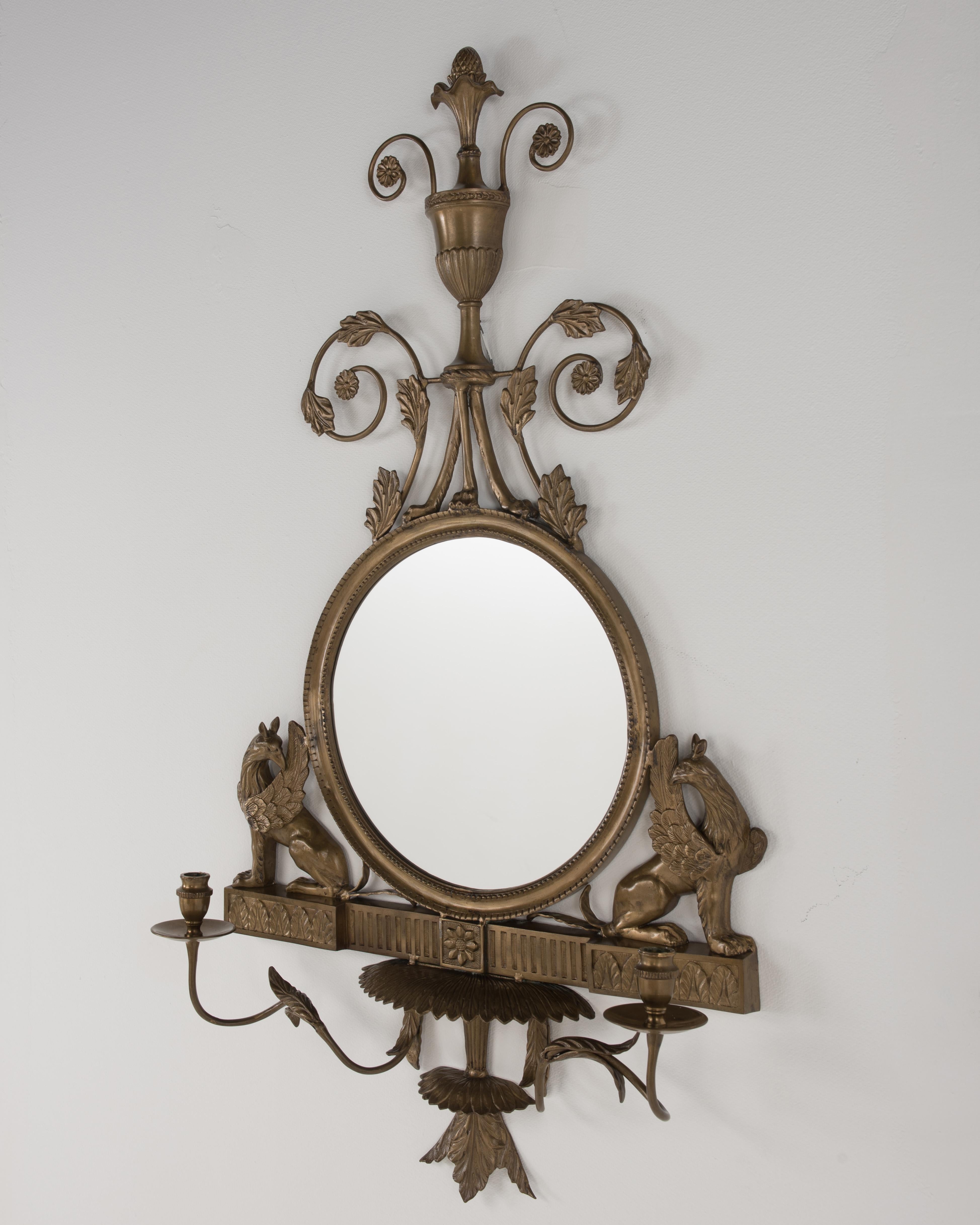 Mid-20th Century Lovely Regency Style Bronze Mirror with Griffins and Candle Sconces