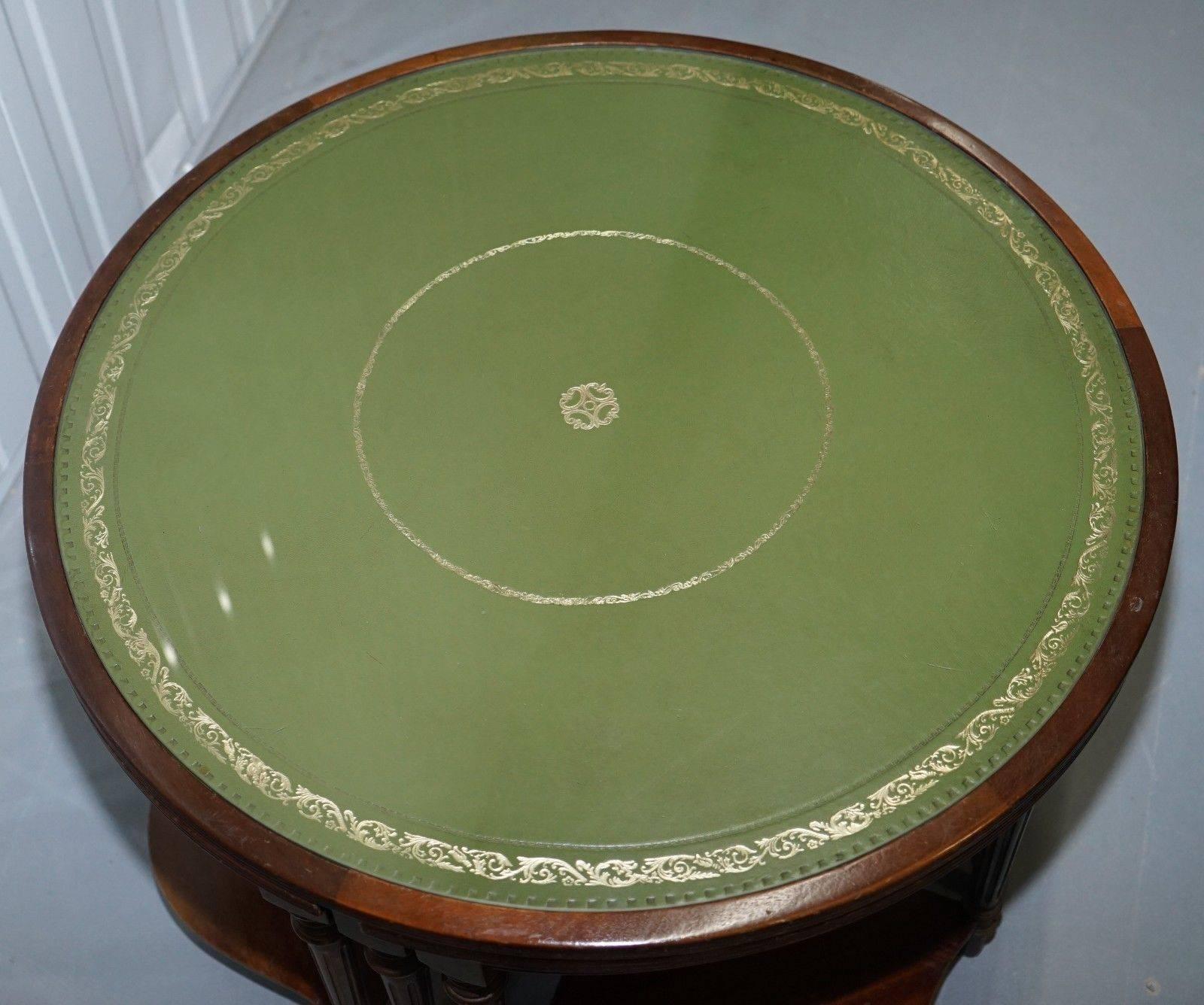 We are delighted to offer for sale this Regency style aged green leather topped coffee table with nested tables under

A very good looking and well-made piece in period condition which is to say some patina marks all over, structurally its