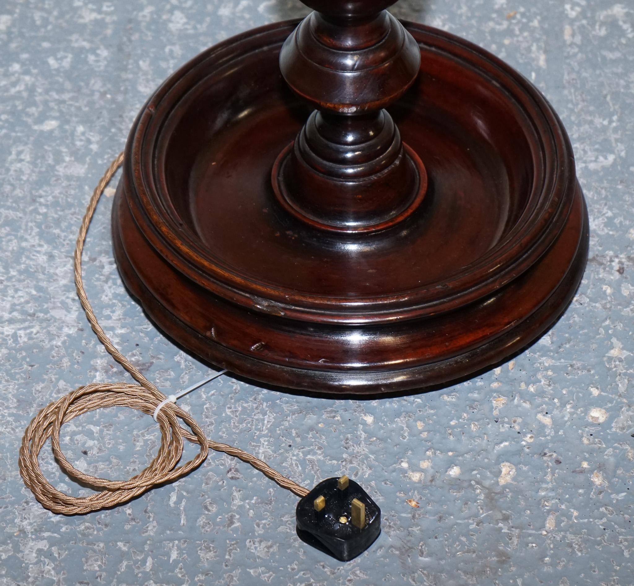 
Antiques of London



We are delighted to offer for sale this Lovely Restored Edwardian Hardwood Barley Twist Floor Lamp.

 It is a stunning example of early 20th-century craftsmanship. The lamp features a beautifully carved barley twist stem,