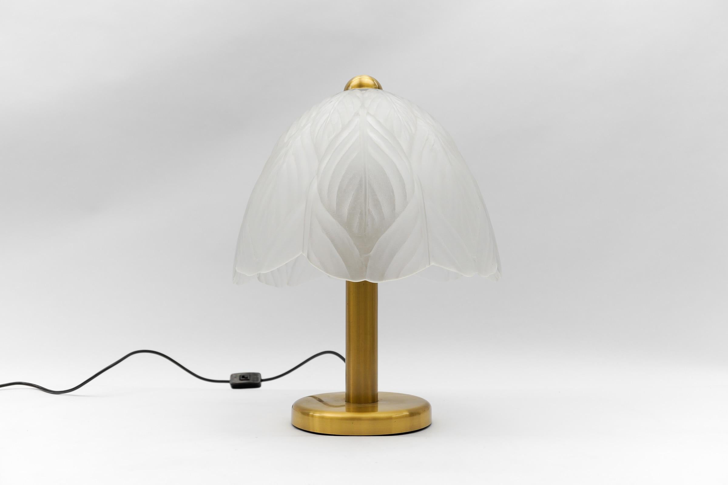Lovely Satin Glass Table Lamp by Peill & Putzler, 1960s

Dimension
Height: 19.29 in (49 cm)
Depth: 12.99 in (33 cm)

The lamp needs 1 x E27 / E26 Edison screw fit bulb, is wired, and in working condition. It runs both on 110 / 230 volt.

Very