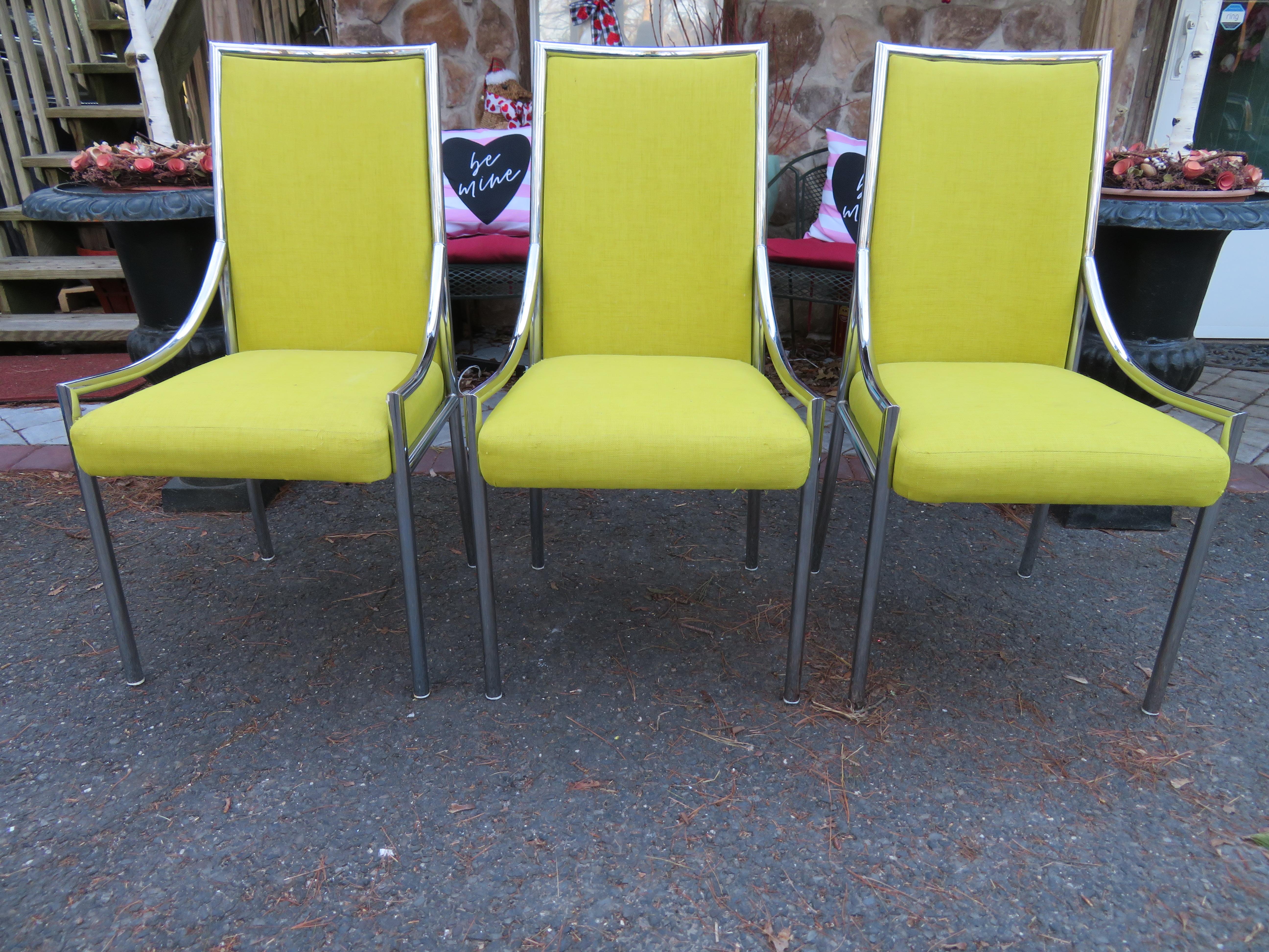 Lovely set of 6 Milo Baughman style chrome dining chairs. We love the rounded chrome tube frames in very nice vintage condition. The upholstery is dated and worn and will need to be reupholstered but we love the original sunny yellow color. These