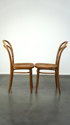 Lovely set of 2 brown vintage Thonet/bistro chairs with woven seats