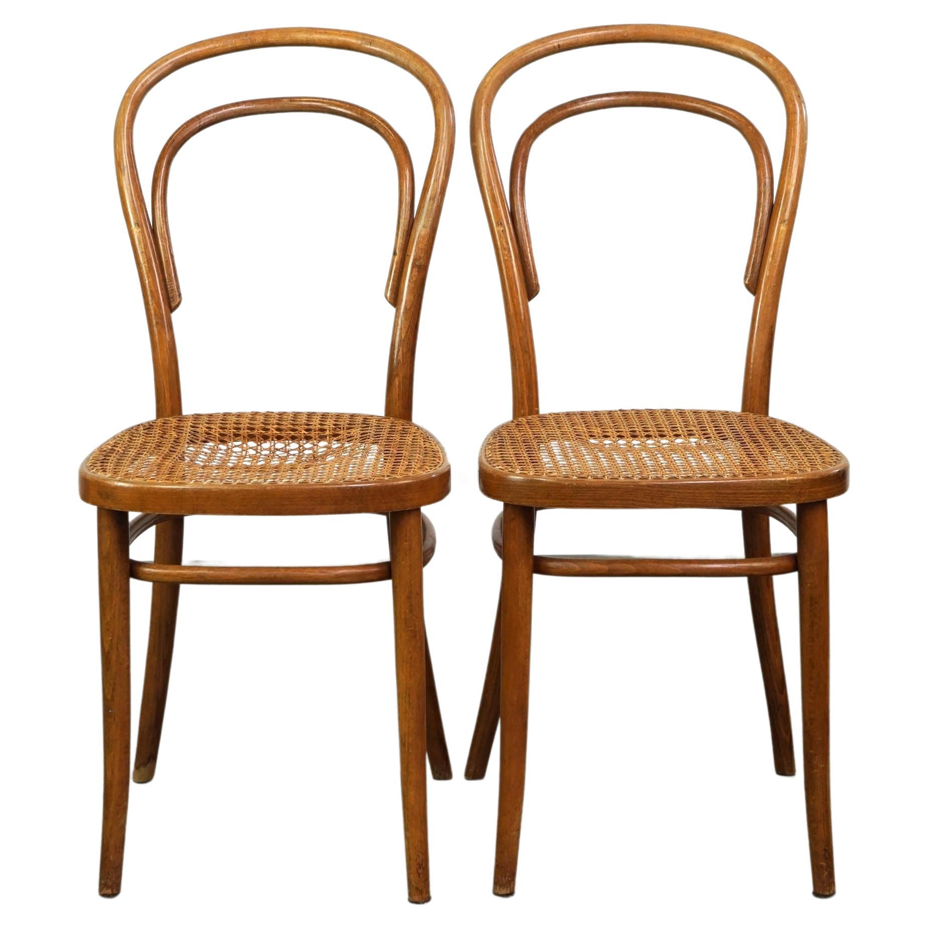 Lovely set of 2 brown vintage Thonet/bistro chairs with woven seats