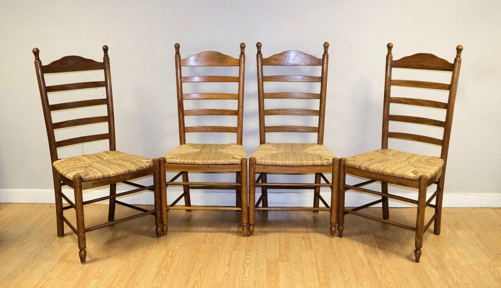 We are delighted to offer for sale this lovely set of 4 Farmhouse Oak rush seat vintage ladder back dining chairs.

This versatile and stunning set is presented with original rush woven straw seat and oak frame. The simplicity is just perfect for