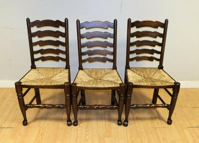 Country Lovely Set of Eight Elm Ladder Back Dining Chairs on Woven Rush Seat For Sale