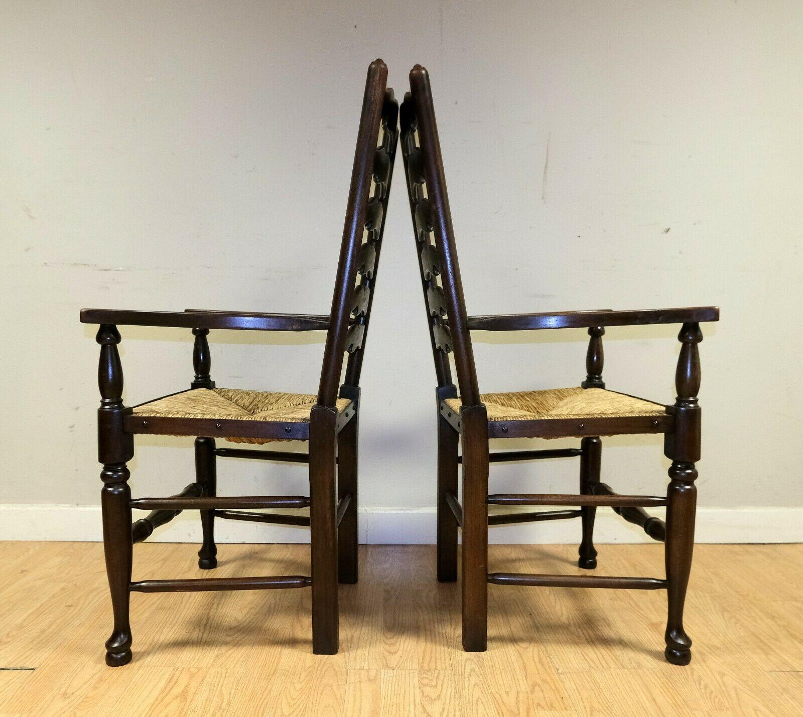 English Lovely Set of Eight Elm Ladder Back Dining Chairs on Woven Rush Seat