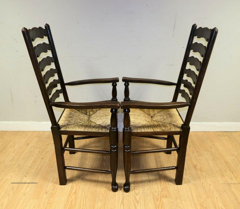 20th Century Lovely Set of Eight Elm Ladder Back Dining Chairs on Woven Rush Seat For Sale