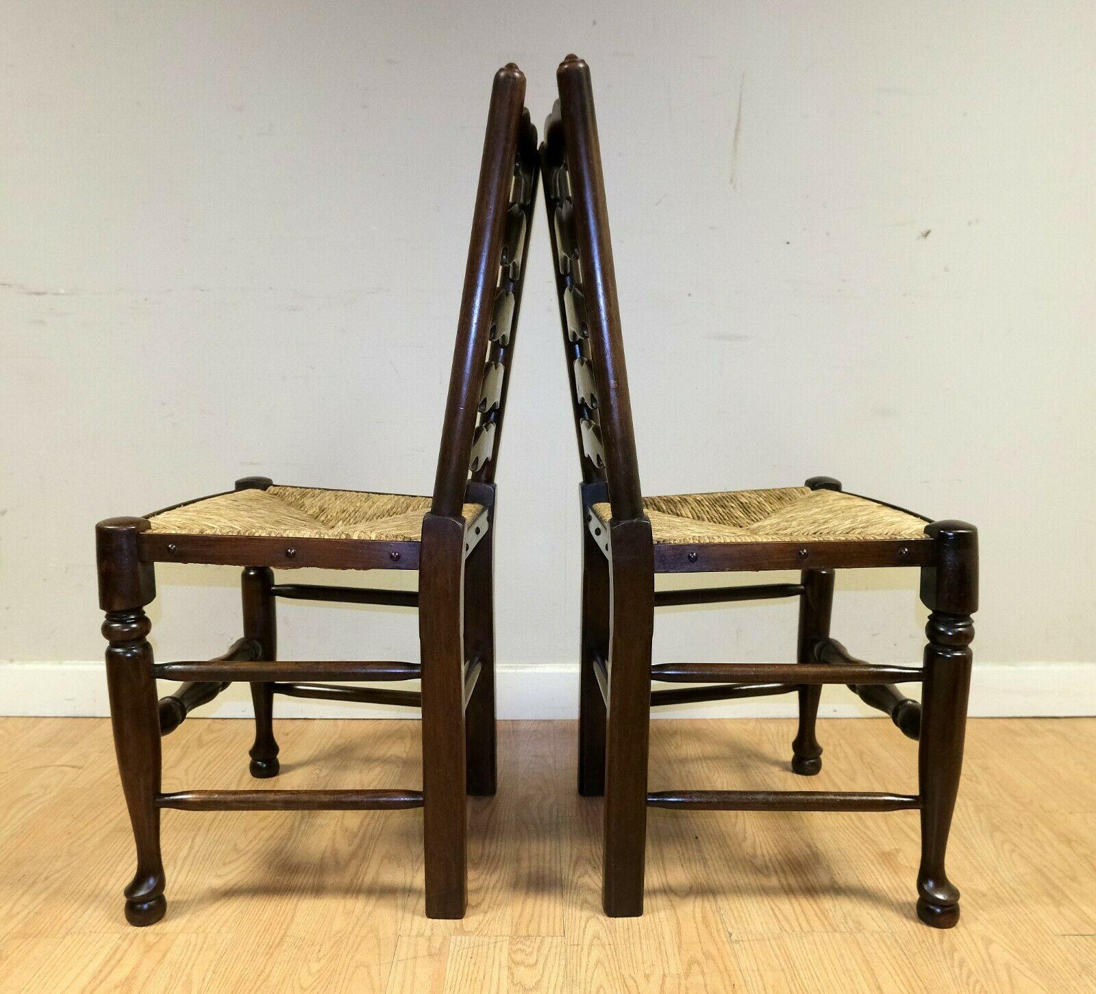 20th Century Lovely Set of Eight Elm Ladder Back Dining Chairs on Woven Rush Seat