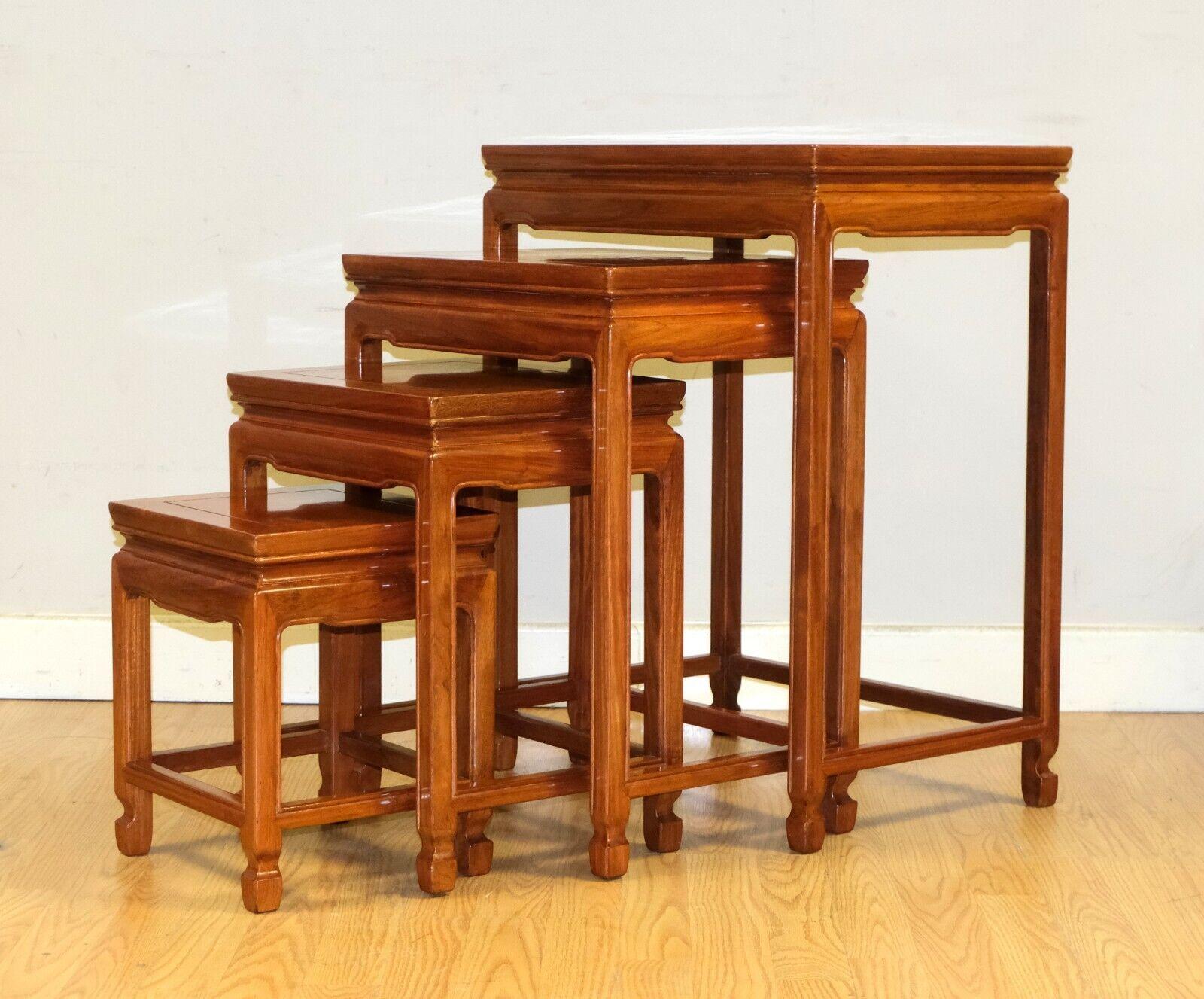 We are delighted to offer for sale this lovely set of four Chinese hardwood nests of tables on hoof feet . 

This well made, simple but elegant set is a great addition to any room. The items are presented with lovely moulded tops, supported on