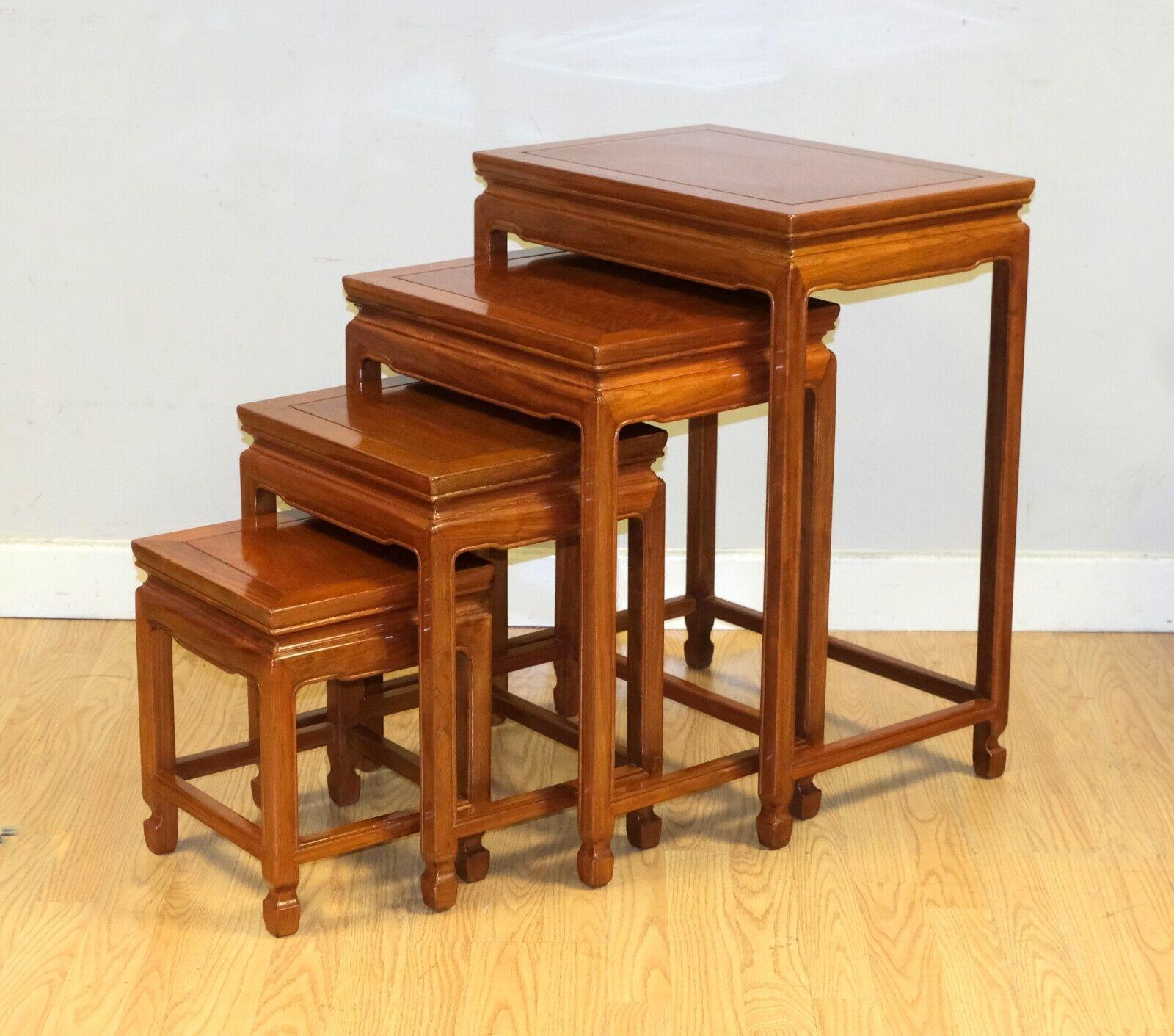 Chinese Chippendale LOVELY SET OF FOUR CHiNESE HARDWOOD NEST OF TABLES ON SQUARE FEET For Sale