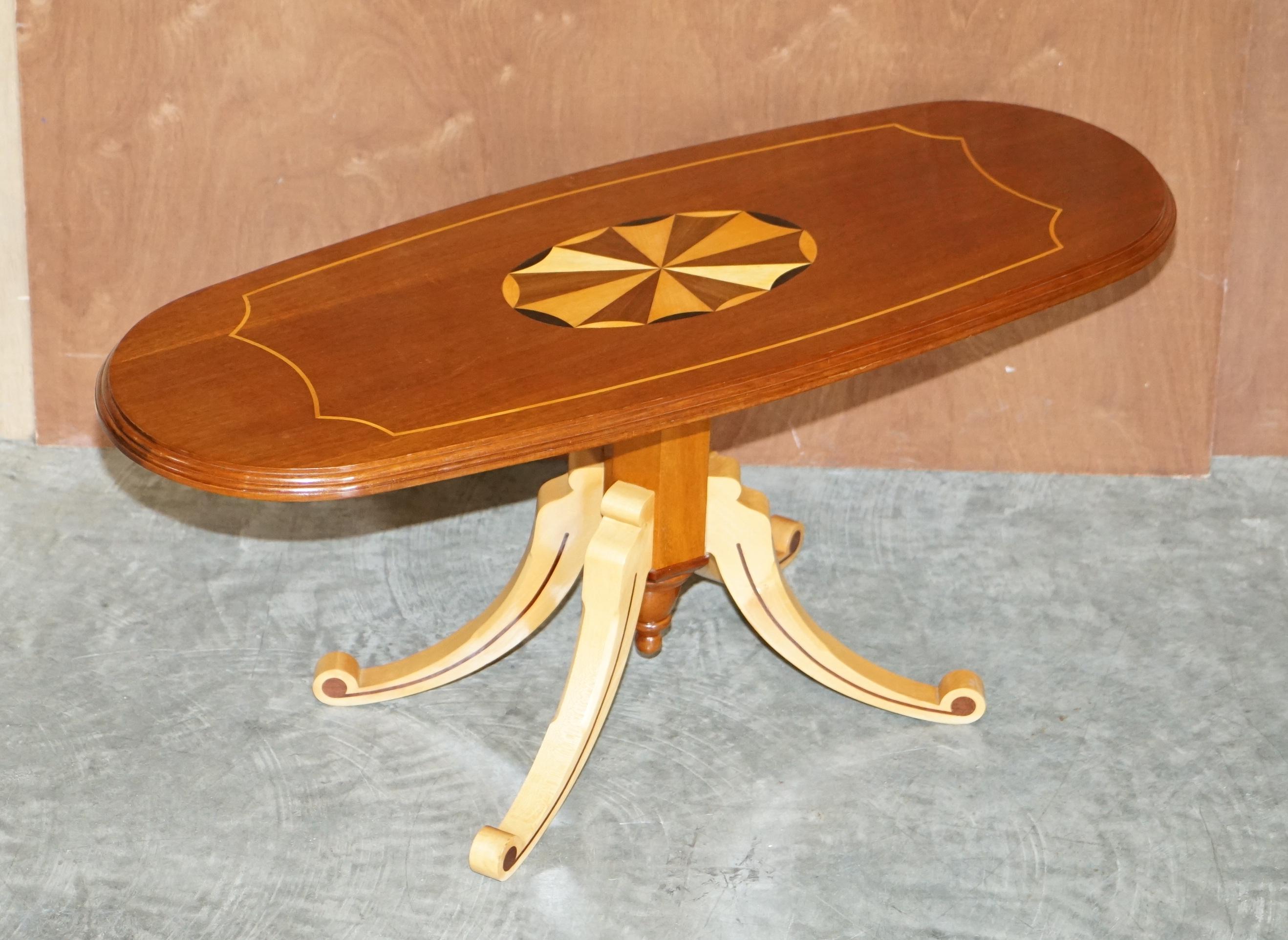 We are delighted to offer for sale this lovely maple and mahogany oval coffee table with Sheraton inlay in the Viscount David Linley style

A very good looking and well made table, it is cut from solid chunks of maple and mahogany, it is very
