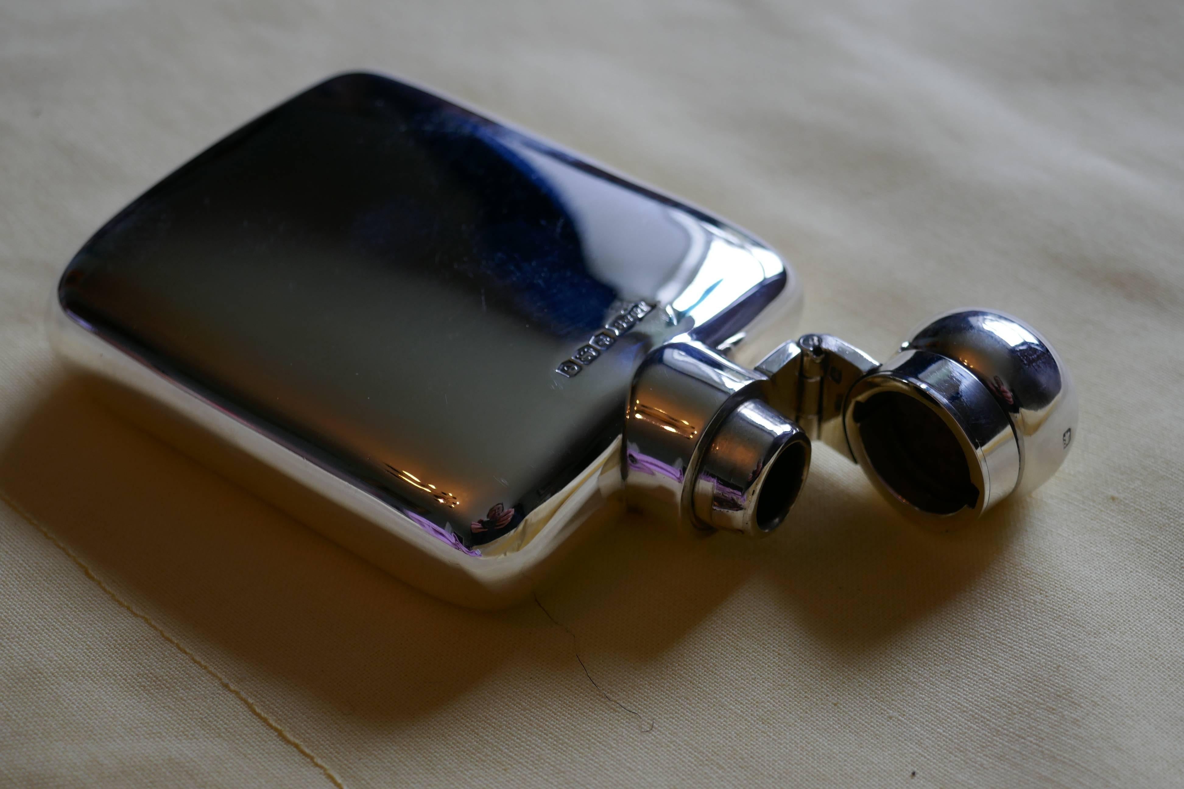Lovely Silver Hall Marked Flask, James Dixon & sons Date 1922

A lovely piece, the flask has a rounded shape with no sharp corners, making it ideal to keep in a small pocket or handbag, the lid is hinged with a screw grip.

The flask is in good