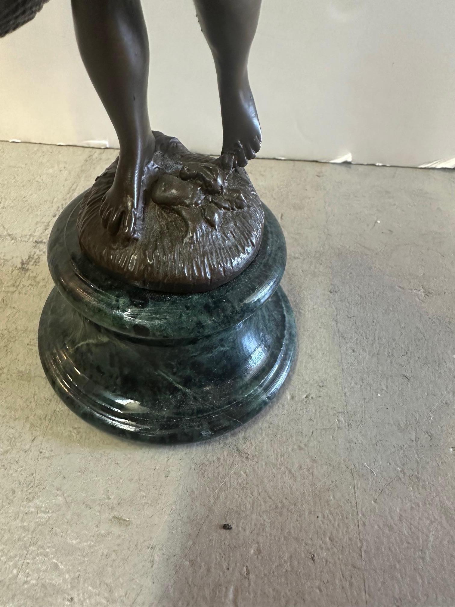Lovely Small Bronze Sculpture of Young Boy with Baskets In Good Condition For Sale In Hopewell, NJ