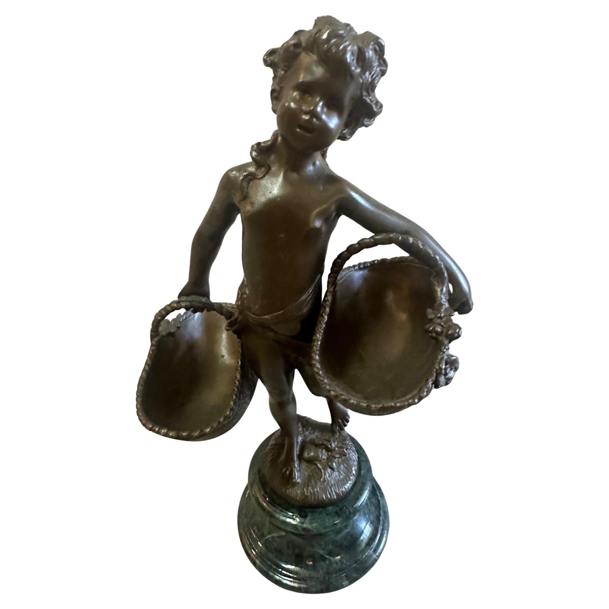 Lovely Small Bronze Sculpture of Young Boy with Baskets For Sale