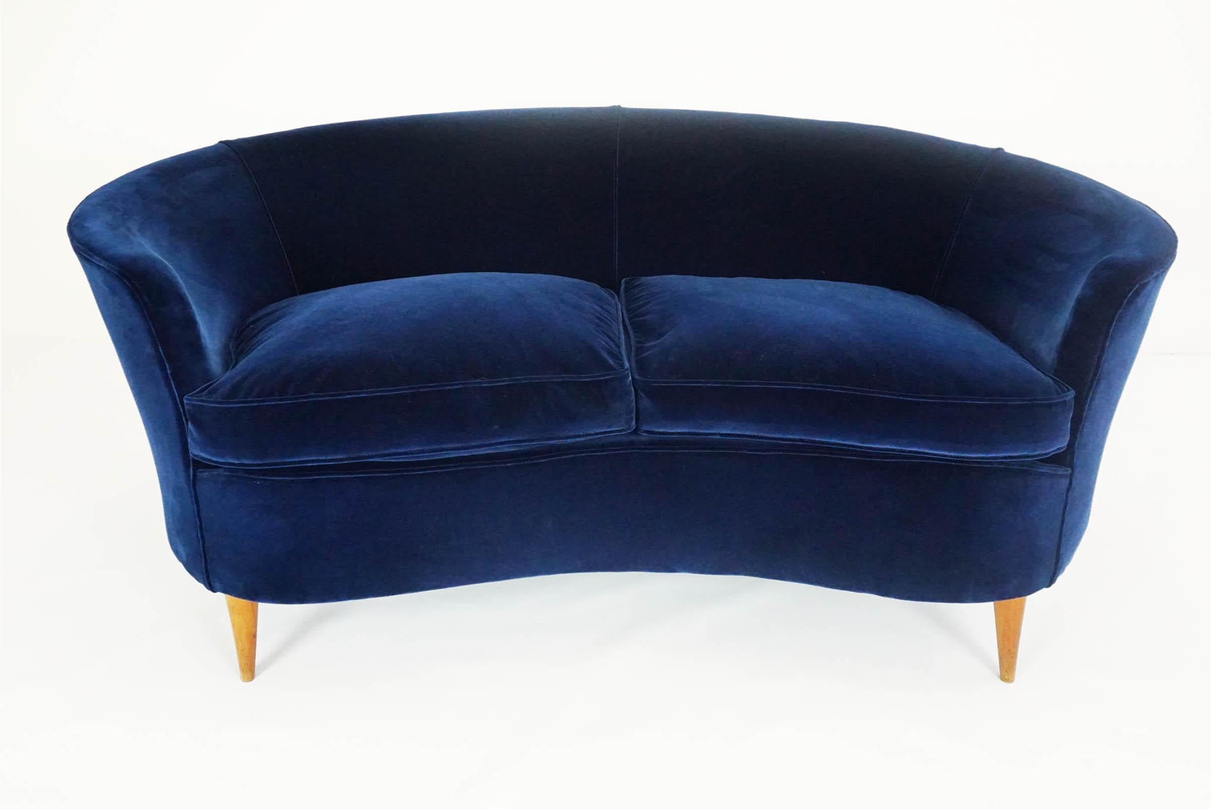 An archived photograph of the present model armchairs and sofa is held as designed by Gio Ponti - in the 