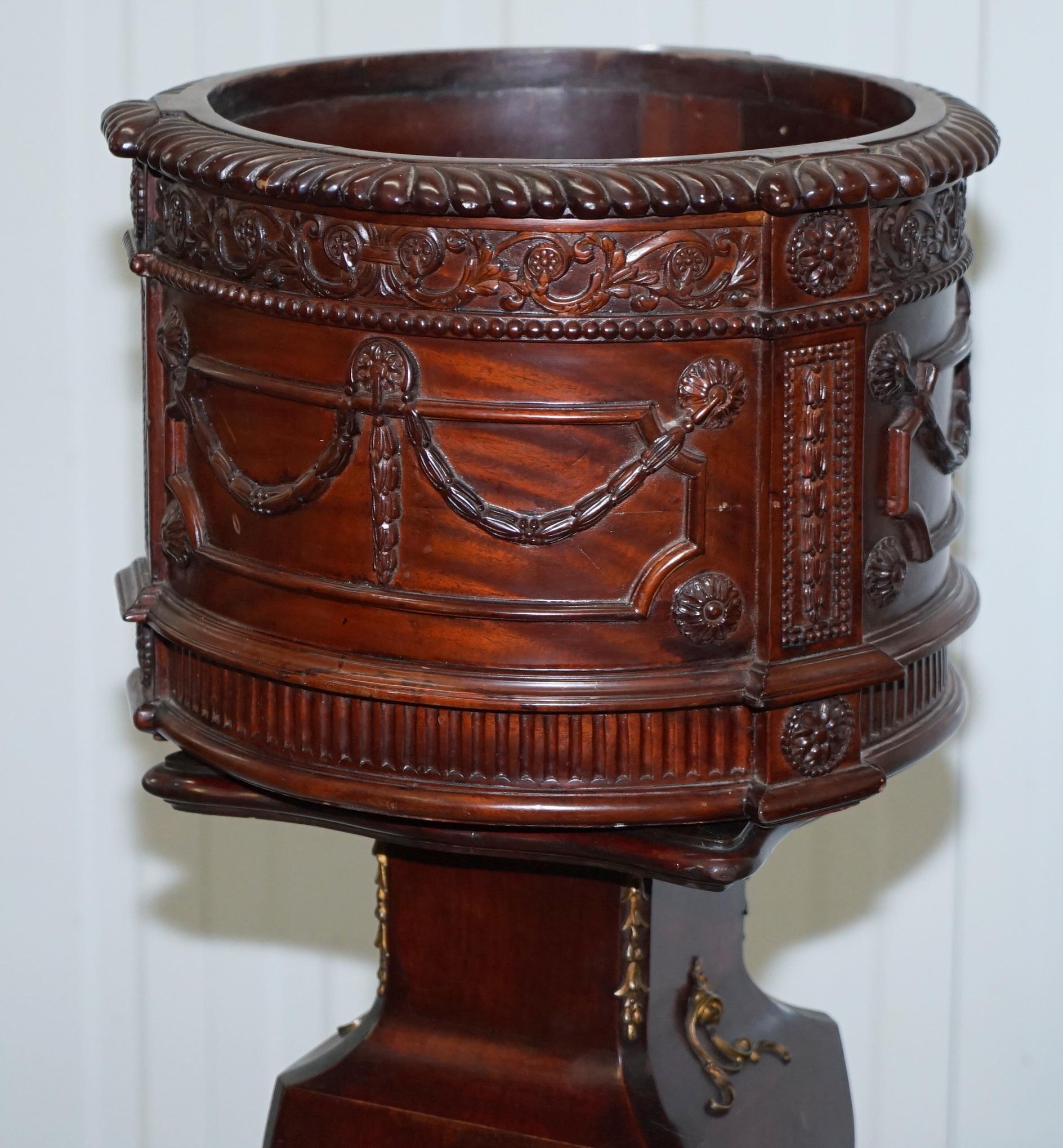 We are delighted to offer for sale this lovely solid mahogany French Imperial plant pot with ornate hand-carved detailing

Please note the delivery fee listed is just a guide, it covers within the M25 only

A good looking and well-made piece,