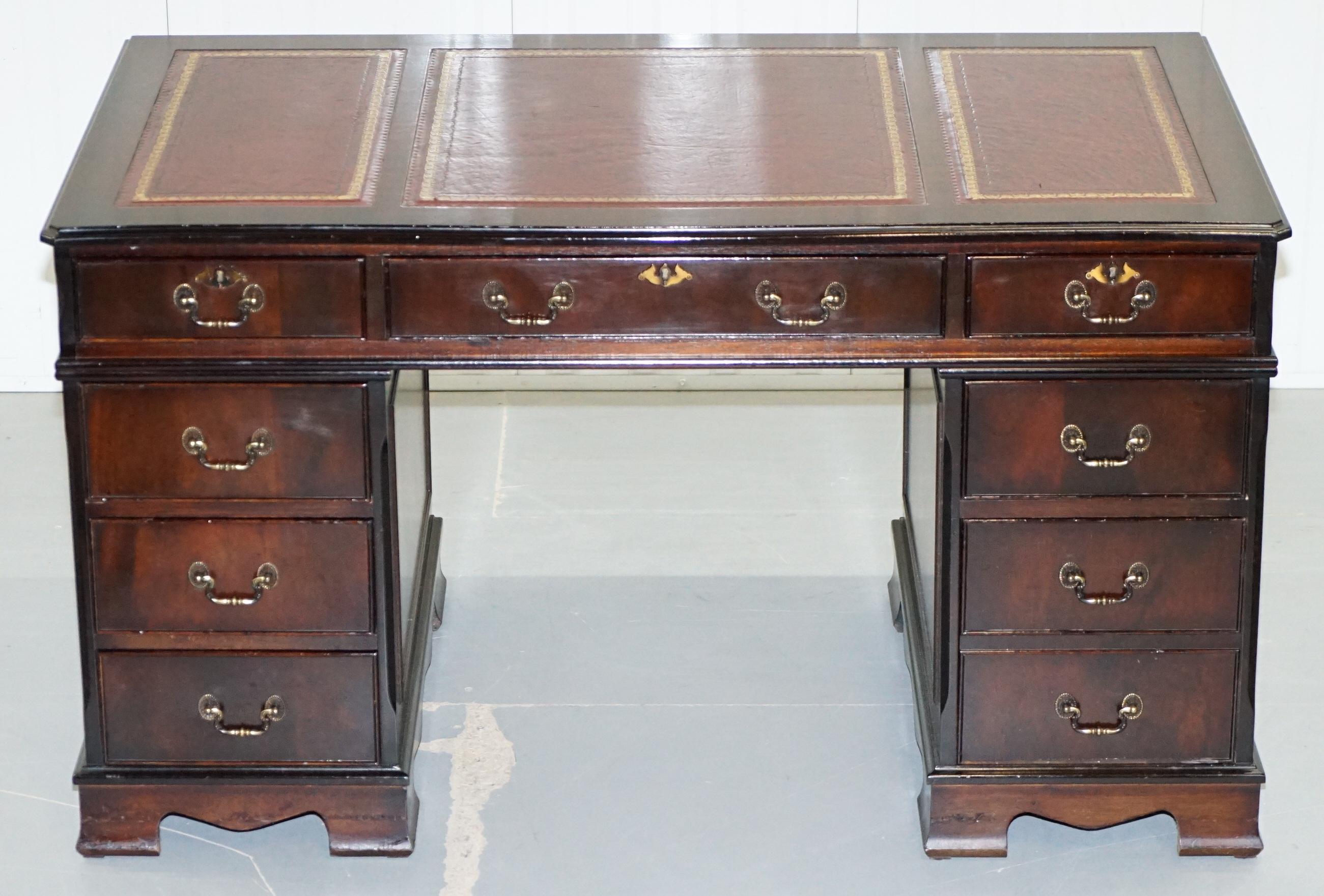 We are delighted to offer for sale this Premium twin pedestal partner desk finished in luxury mahogany with an oxblood leather top 

A very good looking and well-made desk with a lovely timber patina, the leather top is original and nicely worn