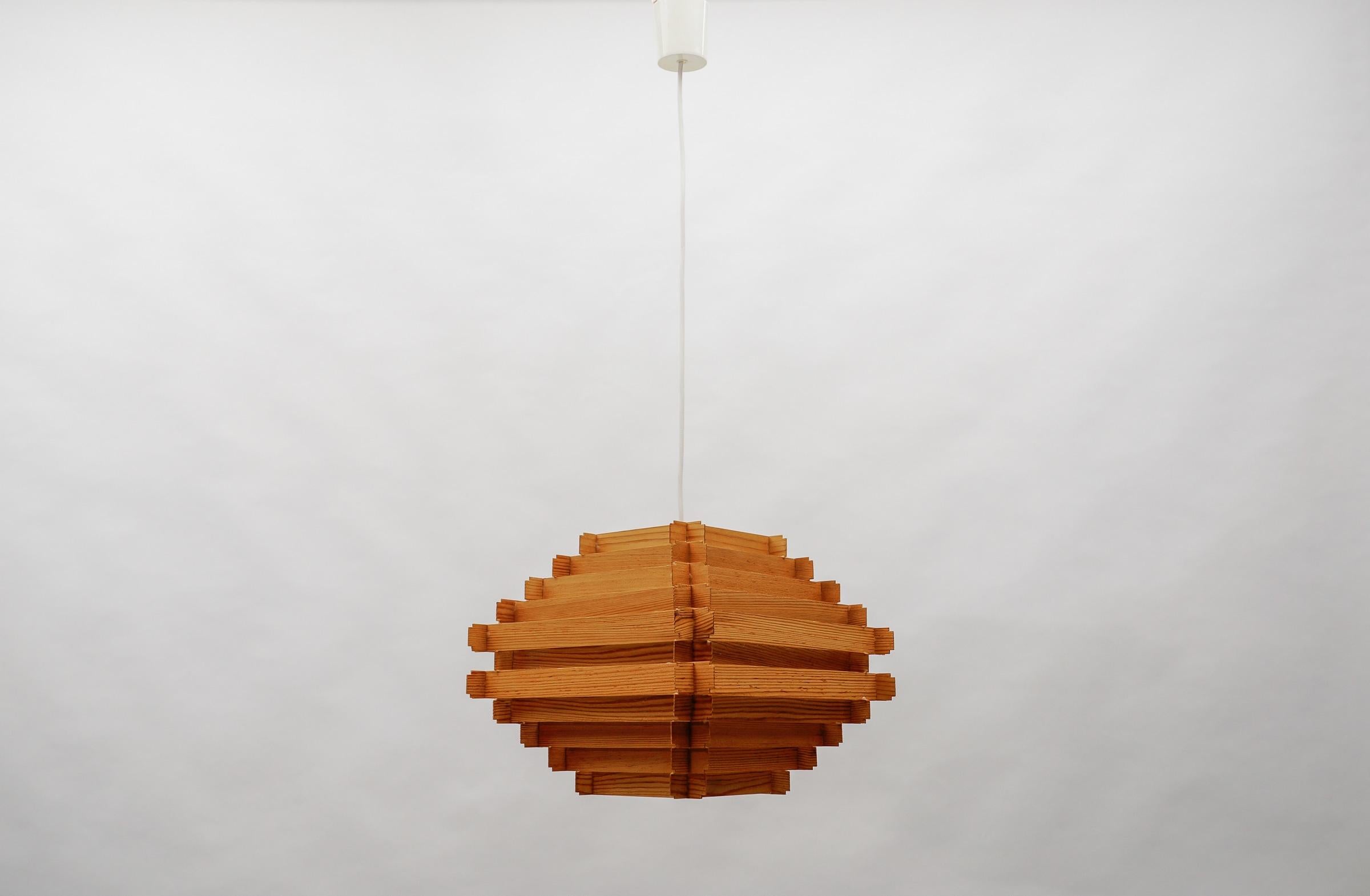 Lovely Stepped Wooden Ceilling Slat Lamp, 1960s Scandinavian

The lamp is executed with 1x E27 Edison screw fit bulbs. It is wired and in working condition. It runs both on 110 / 230 volt.

Our lamps are checked, cleaned and are suitable for use in