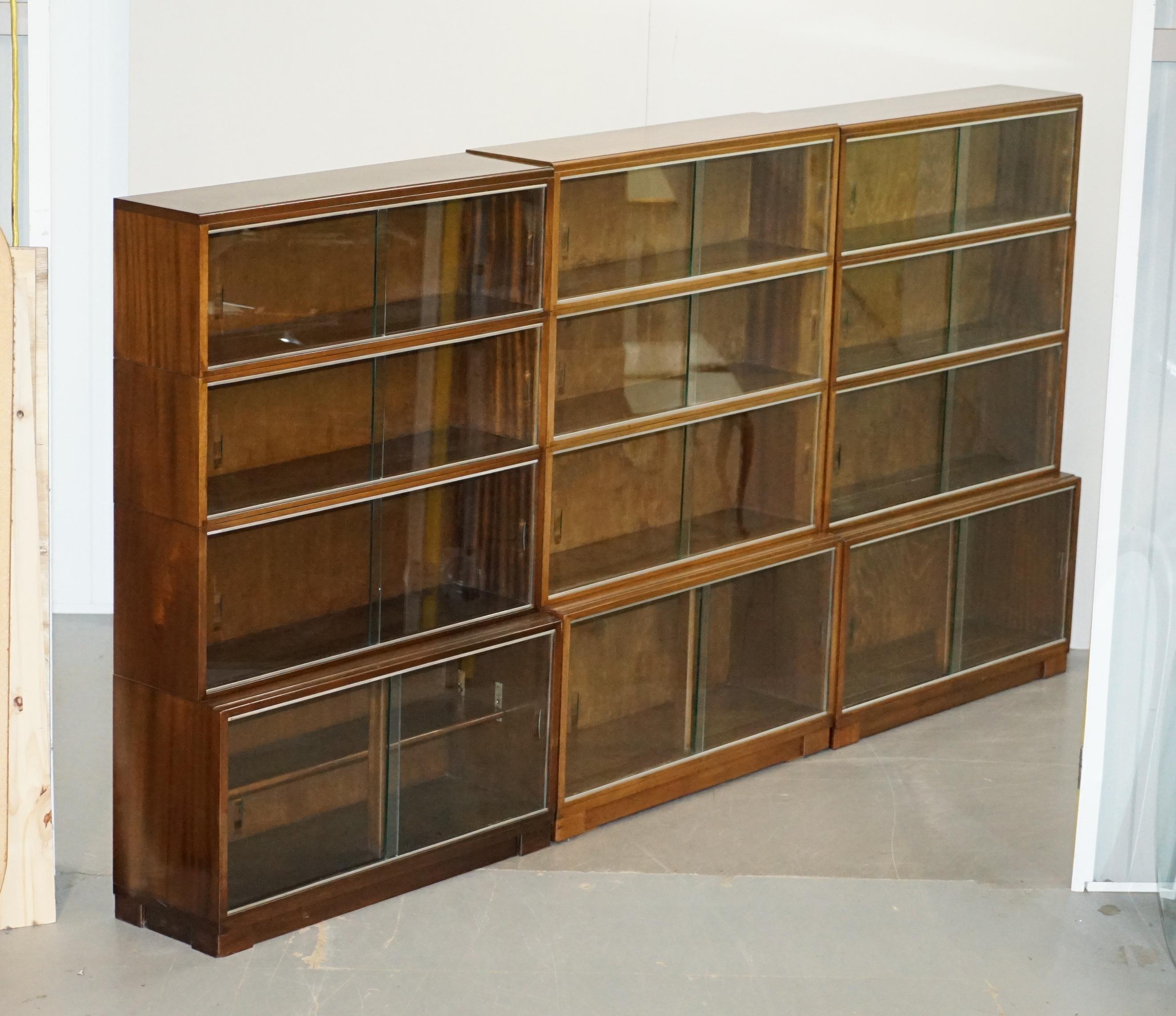 We are delighted to this stunning suite of three Minty Oxford Legal modular stacking bookcases with glass sliding doors

A good looking well-made and versatile set, modular bookcases break down into different sections so you can adjust the height