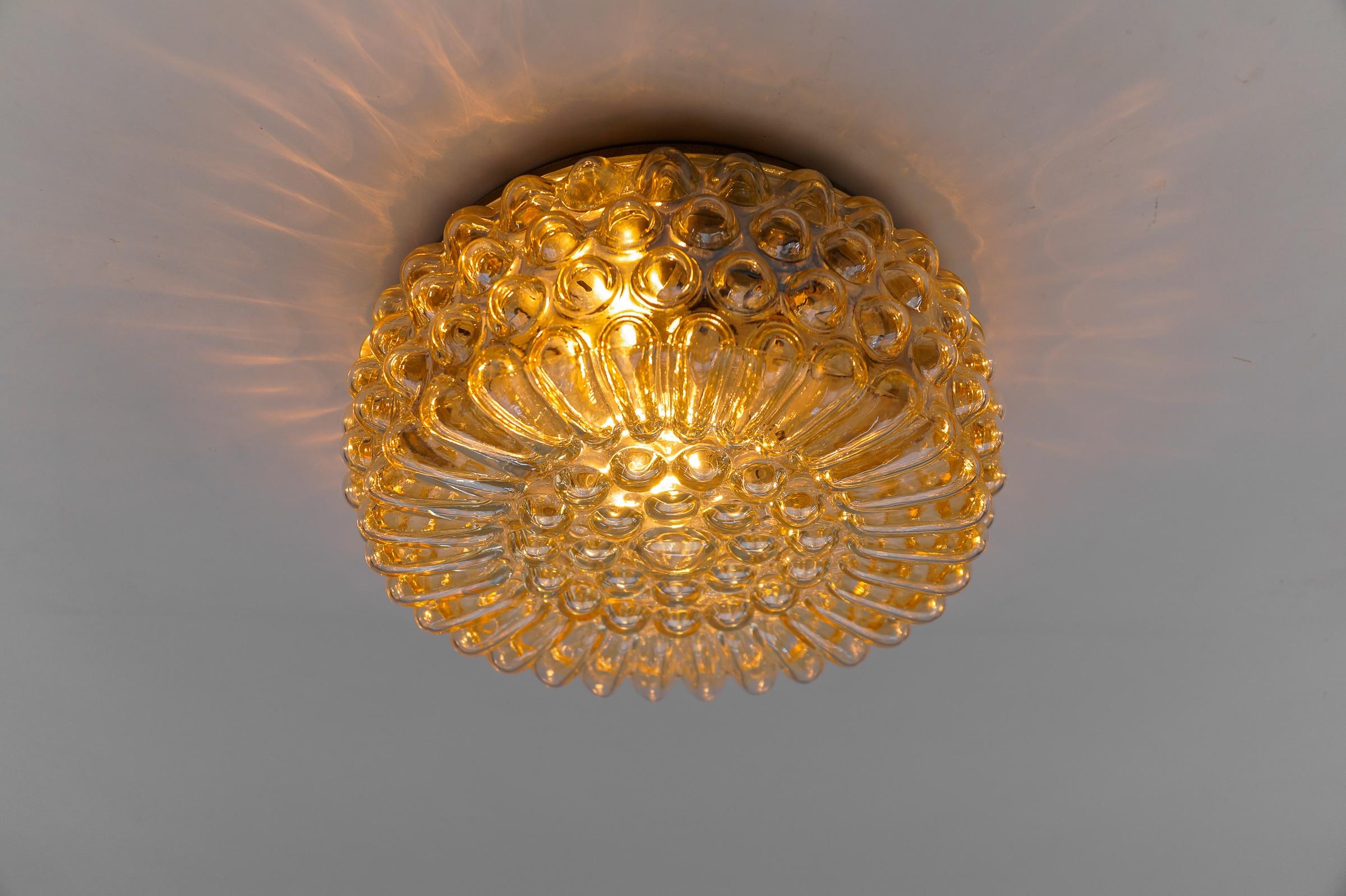 Mid-Century Modern Lovely Sunburst Round Amber Bubble Glass Wall Lamp / Flush Mount, 1960s Limburg For Sale