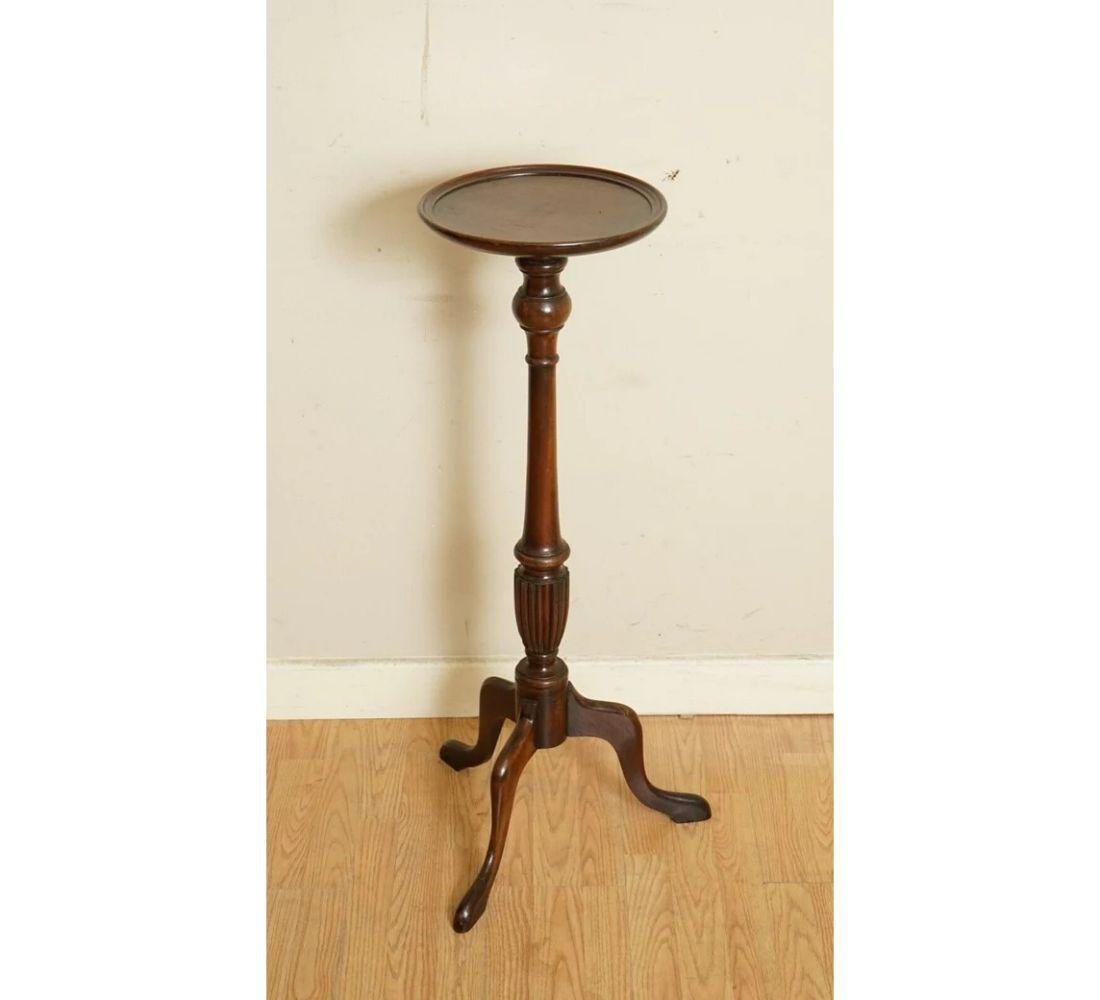 We are delighted to offer for sale this elegant antique carved tall plant end side table.

A beautiful well made and solid tripod table. We have lightly restored this by giving it a hand clean all over, hand waxed and hand polished.