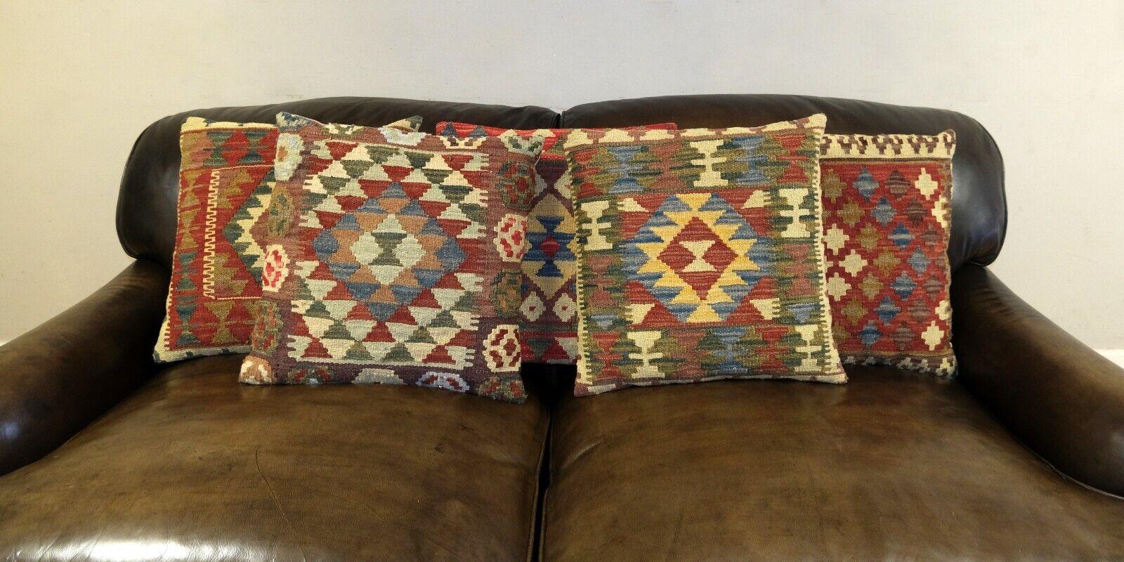 We are delighted to offer for sale this lovely set of four traditional Kilim handmade wool square cushions.

This set has been handwoven with traditional kilim, flat weave technique, which is presented in geometric colours such as beige, red, blue,