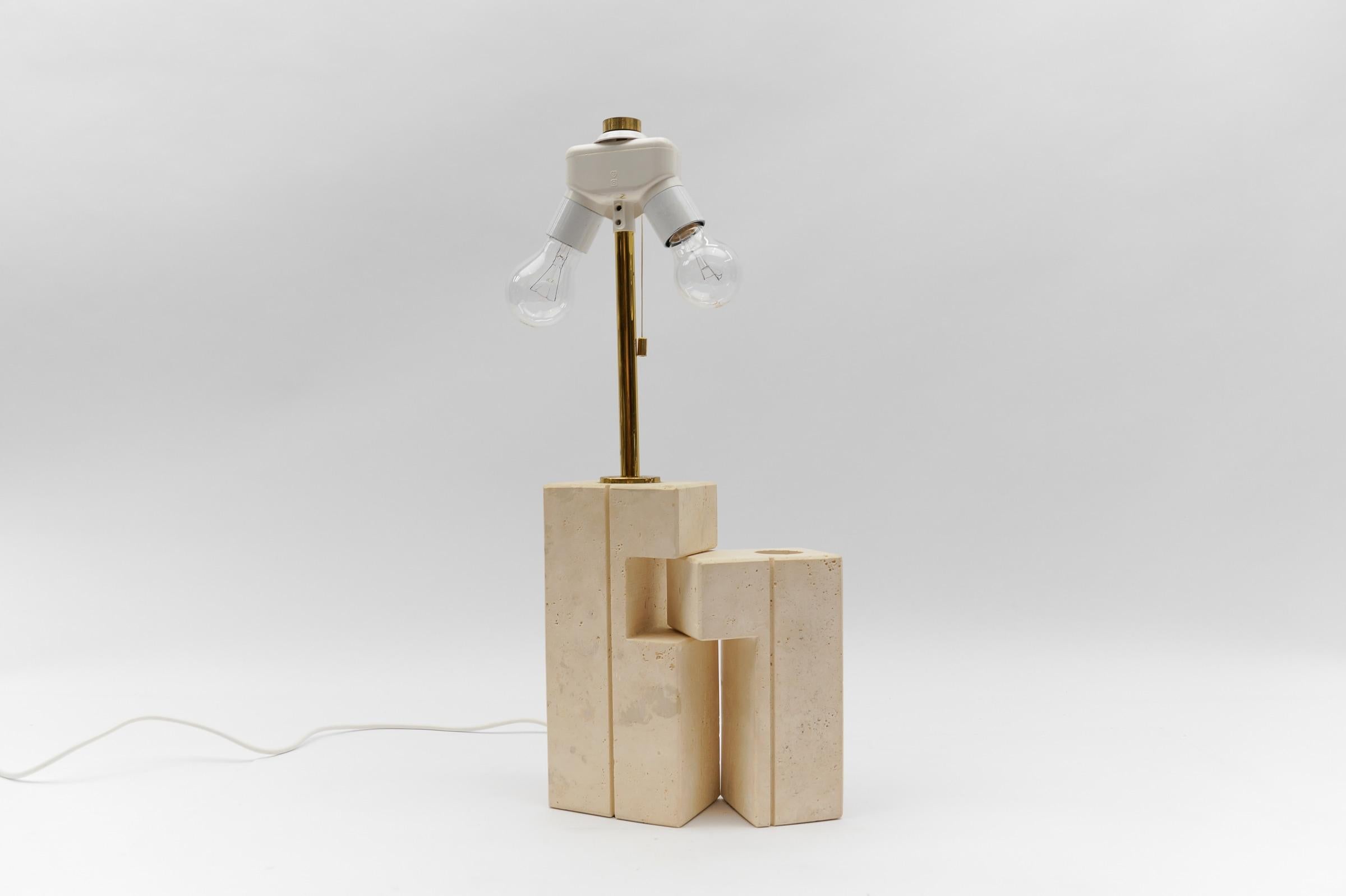 Lovely Travertine Table Lamp by Giuliano Cesari for Nucleo Sormani, 1960s, Italy

The lampshade is to illustrate how the lamp base looks with a shade. The shade has a diameter of 17.71 in. (45 cm) and height 11.41 in. (29 cm).

Very good condition.