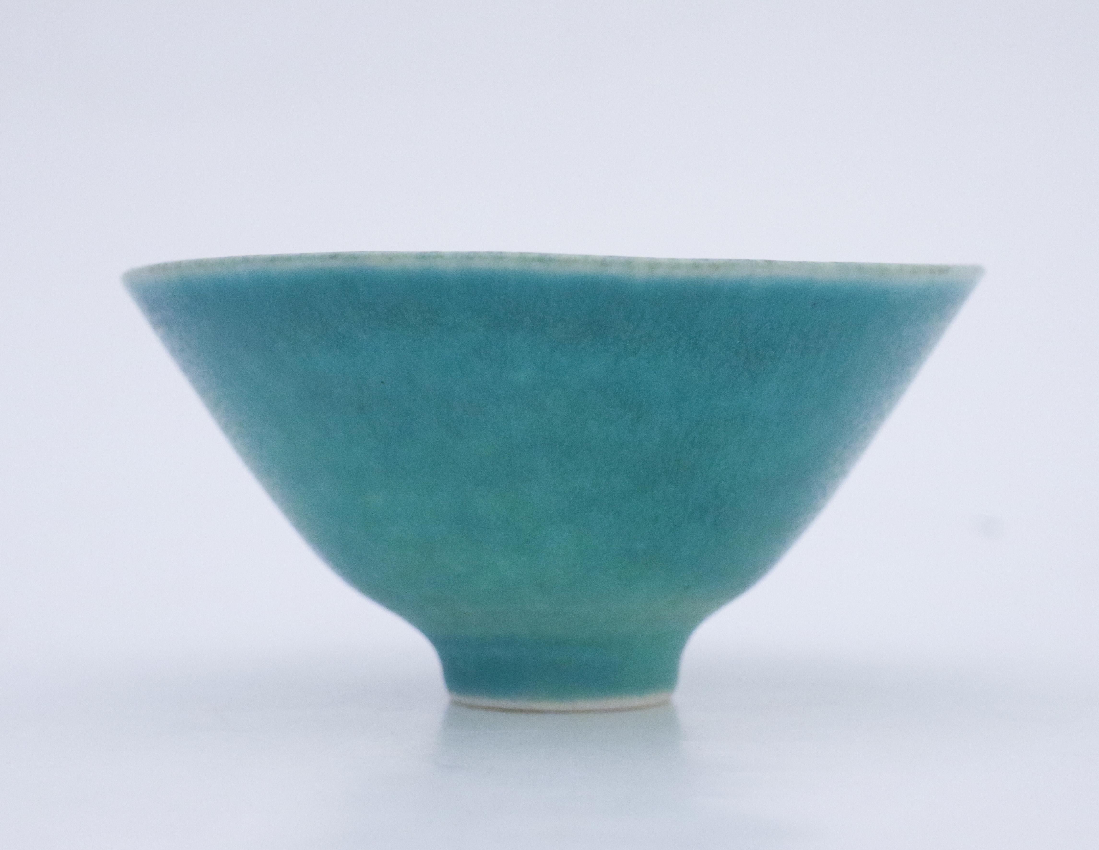 A lovely turquoise mid-century bowl in ceramic from Rörstrand, Sweden, designed by Carl-Harry Stålhane. The bowl is marked as 1st quality and in excellent condition. 

Carl-Harry Stålhane is one of the top names when it comes to Mid century