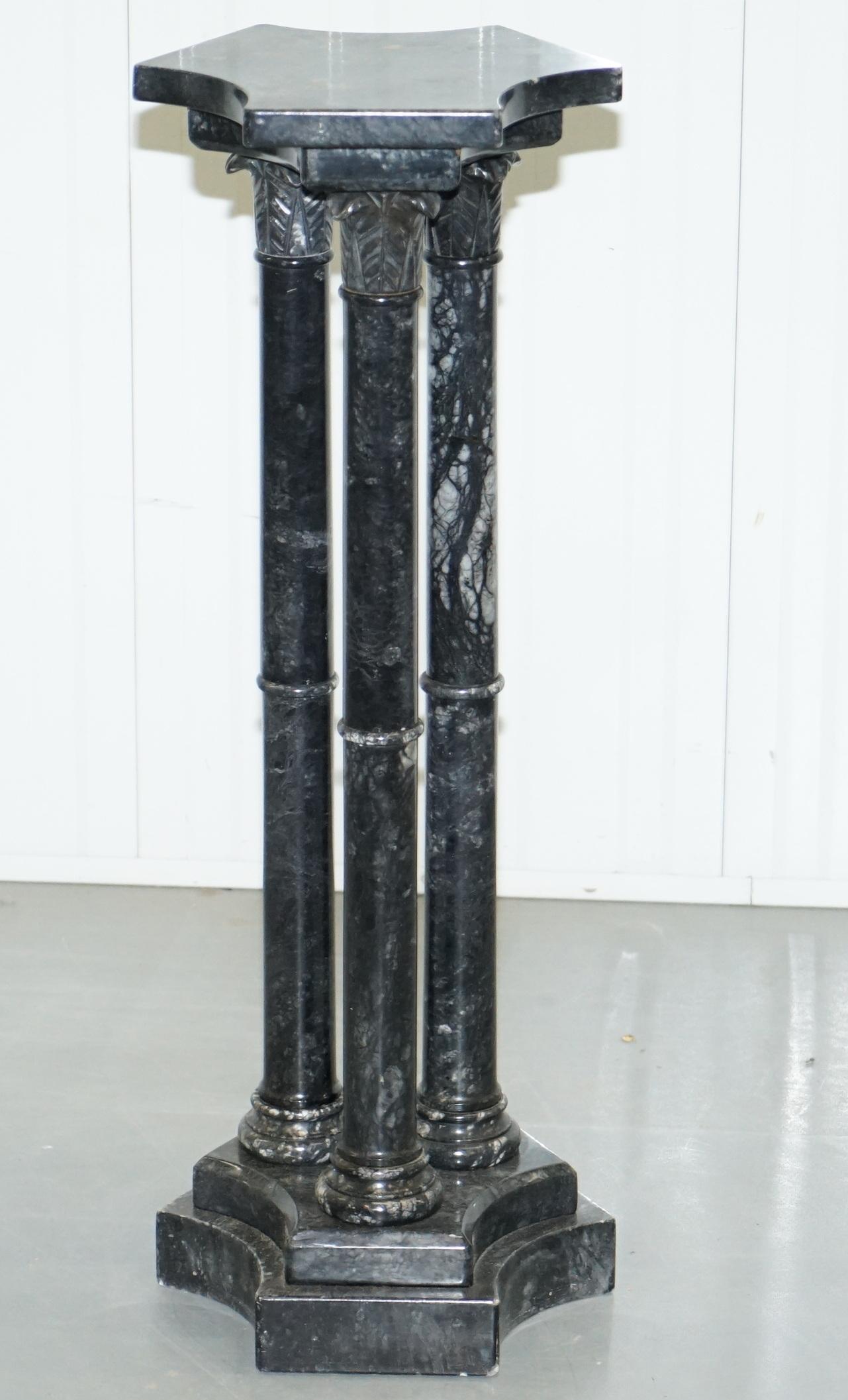 Wimbledon-Furniture is delighted to offer for sale this stunning original solid marble pedestal stand with three central Corinthian pillars 

Please note the delivery fee listed is just a guide, it covers within the M25 only, for an accurate quote