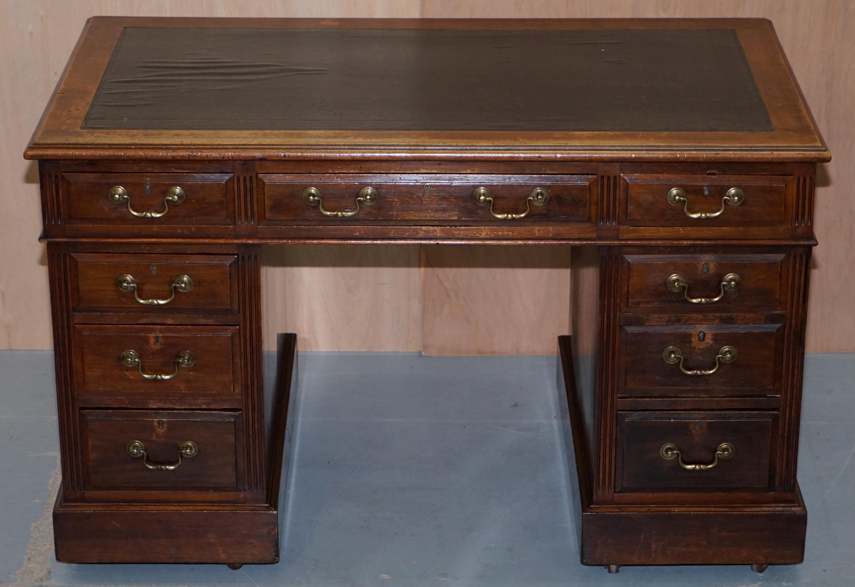 We are delighted to offer for sale this lovely English paneled Mahogany Victorian Circa 1880 twin pedestal partner desk with original fittings and brass castors 

A good looking and well made desk in period lightly restored condition throughout.