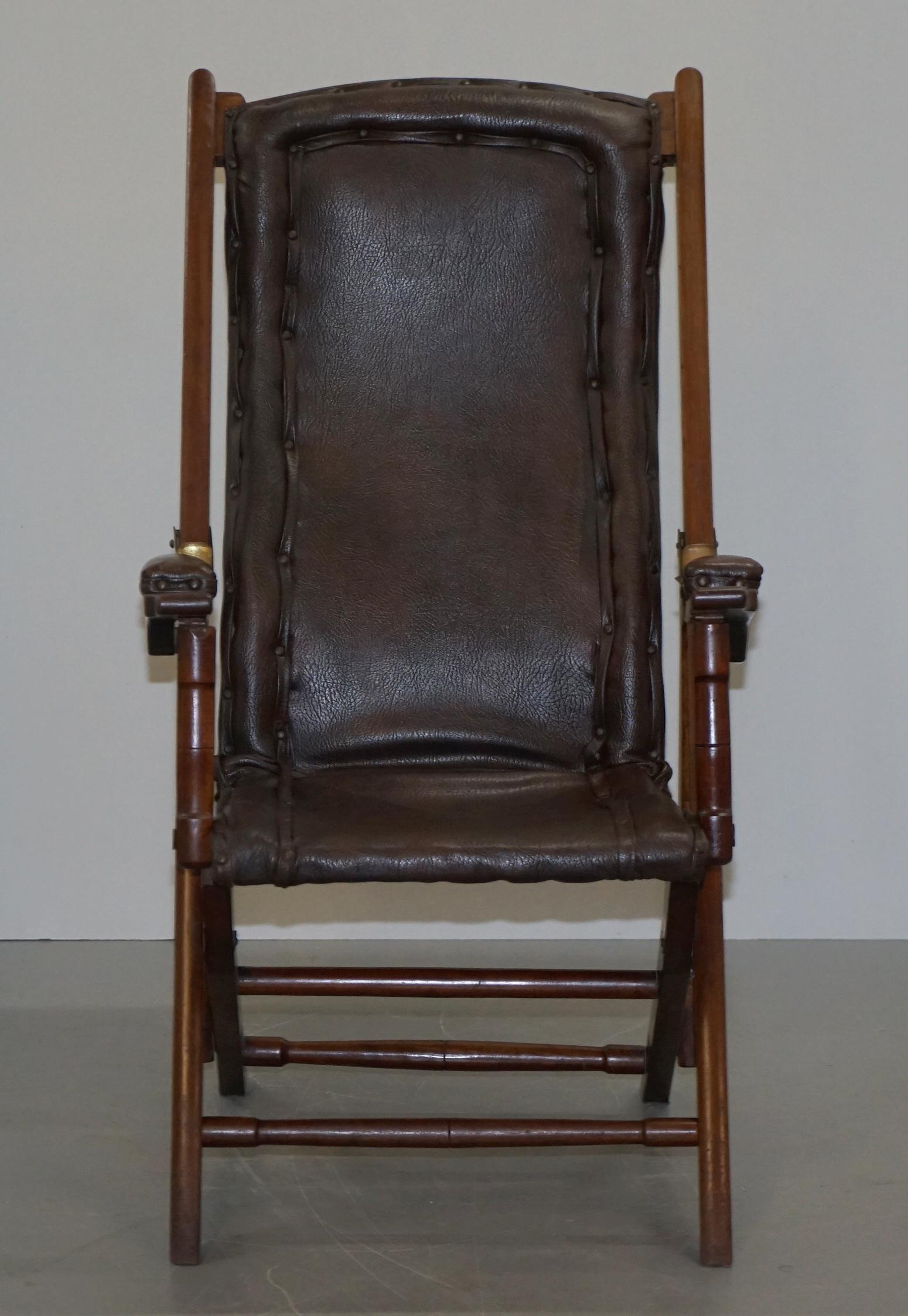 We are delighted to offer for sale this lovely original circa 1890 Military Campaign style folding deck steamer armchair with multiple seating positions

This chair dates back to 1890, it has the original Rexene upholstery which was purposely
