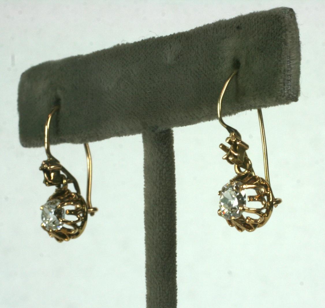 Wonderful Victorian Mine Diamond Earrings from the late 19th Century. Each diamond weighs conservatively .65 cts. for an approximate total weight of 1.30 carats. 
Bright clean diamonds with wonderful color. No visible defects or inclusions under 10