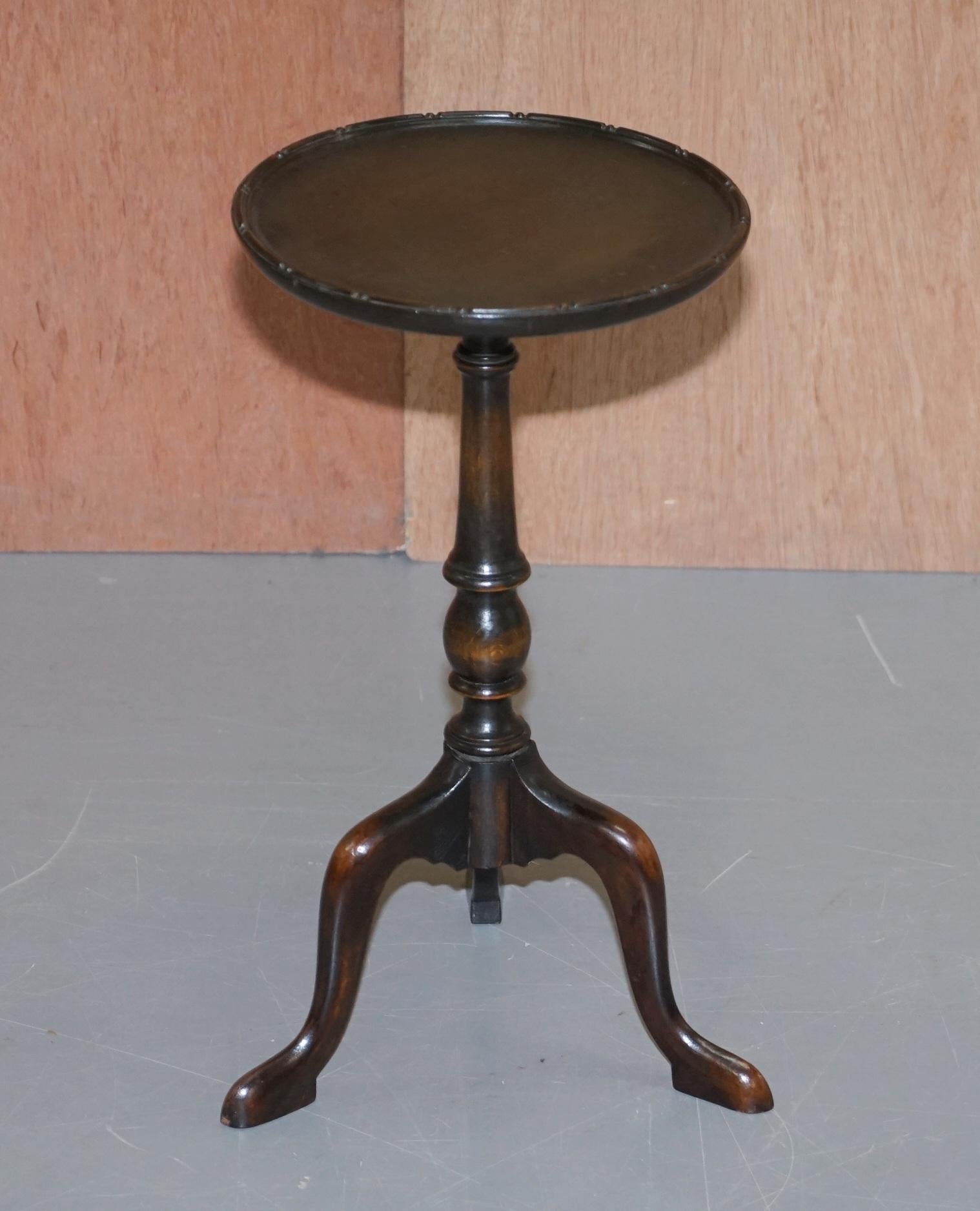 We are delighted to offer for sale this lovely antique Scottish Mahogany lamp or side table with nicely turned column base and carved top edge

A good looking well made tripod table in good condition throughout, we have cleaned waxed and polished