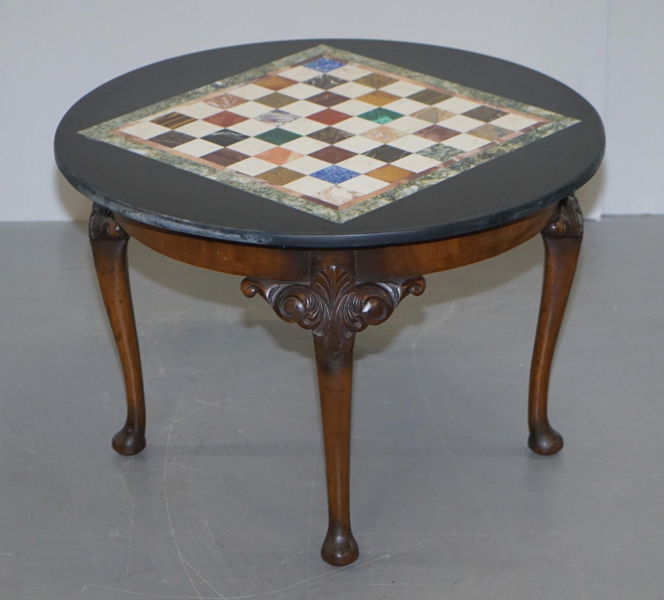 We are delighted to offer for sale this stunning hand carved circa 1900 Victorian Walnut coffee table with Italian Pietra Dura circa 1800 Specimen marble Chess table top

A beautiful find and a lovely marriage. The table base is walnut, its