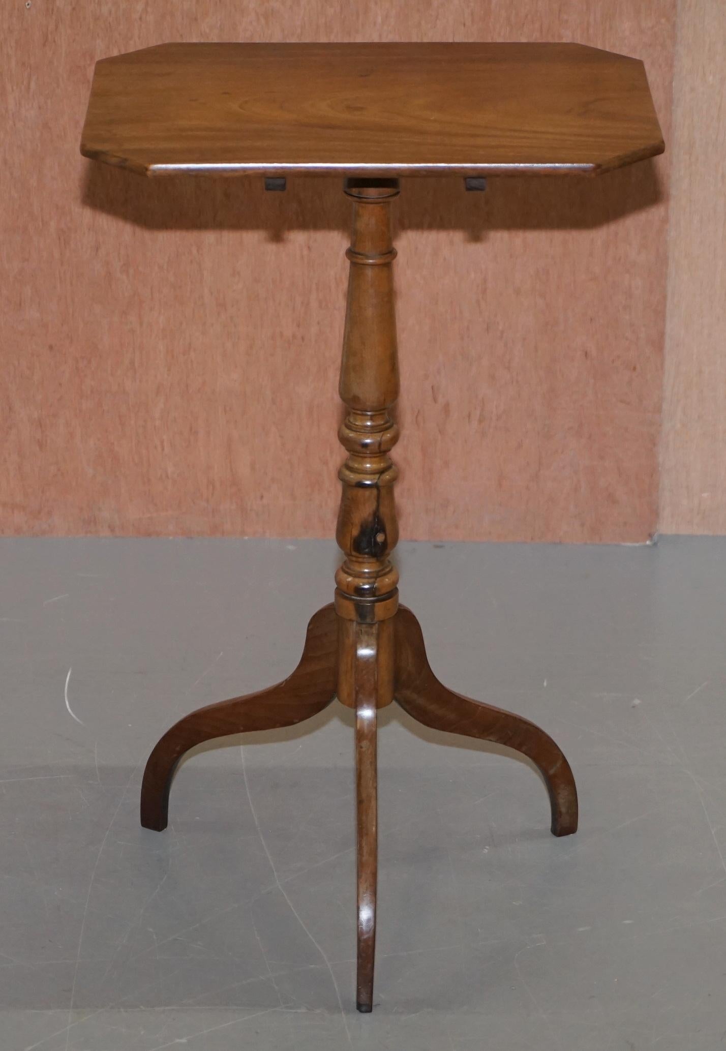 We are delighted to offer for sale this lovely Victorian walnut tripod table

A good looking well made and functional Victorian side table with the original patina. Its rectangle with shaved corners

In terms of the condition we have cleaned