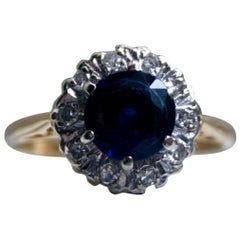 Lovely Vintage 18 Karat Yellow Gold Diamond and Sapphire Halo Ring, 1.75 Carat Lovely Vintage 18 Karat Yellow Gold Diamond and Sapphire Halo Ring, 1.75 Carat