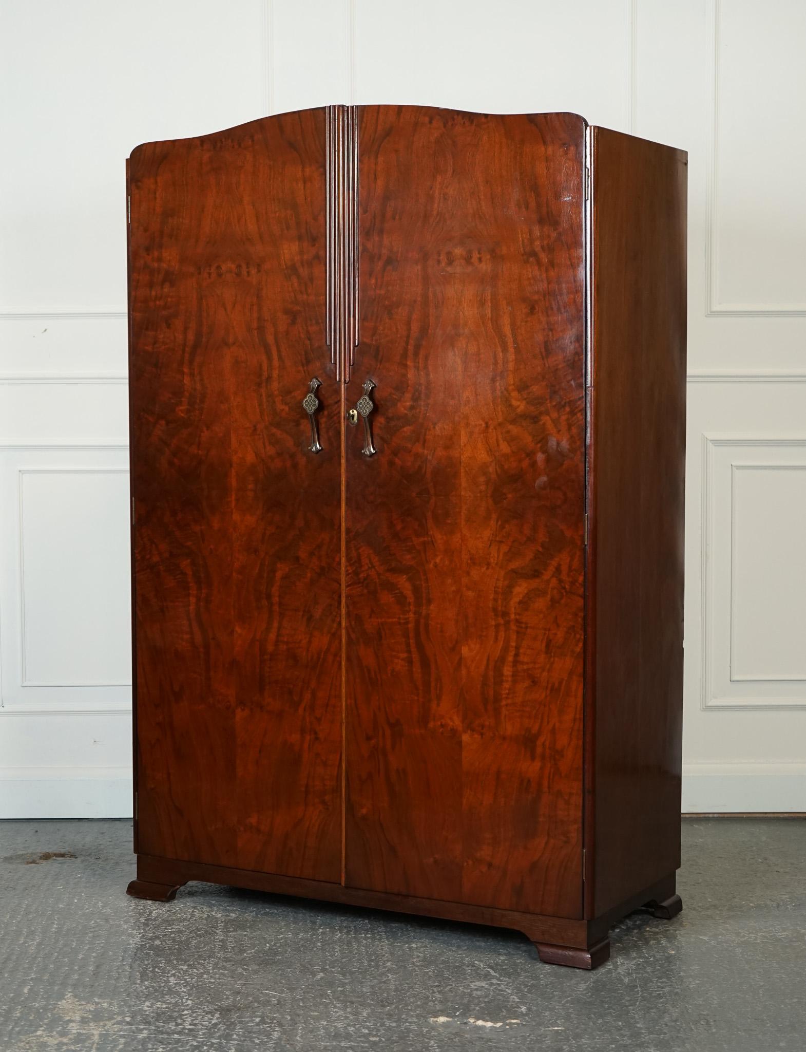 
We are delighted to offer for sale this Lovely Art Deco Burr Hardwood Vintage Double Wardrobe.

The Lovely Vintage 1920's Art Deco Style Wardrobe is a stunning piece of furniture that will instantly transport you back in time to the glamorous