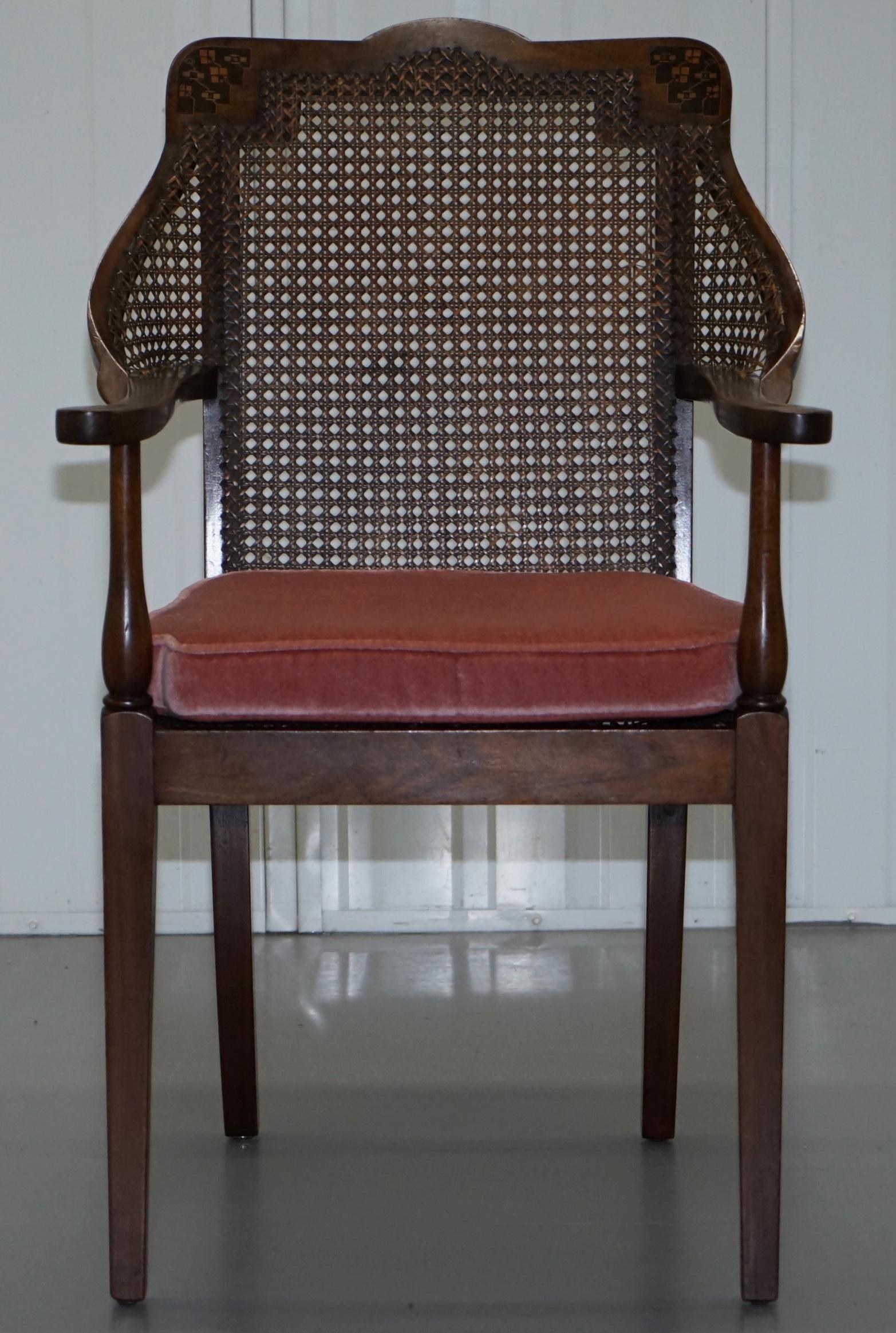 We are delighted to offer for sale this lovely Edwardian Mahogany and rattan armchair with velour seat cushion

A good looking well made and decorative armchair, it is very comfortable and sculptural to look at

Condition wise the seat base