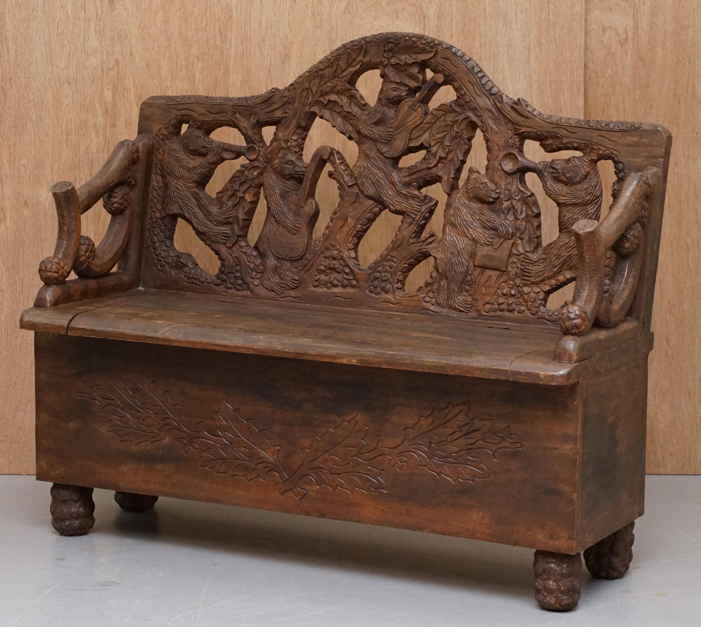 We are delighted to offer for sale this lovely decorative vintage Black Forest wood musical bear bench with internal storage

This bench is part of a suite

The bench is a good looking, decorative and well made piece, its midcentury hence the