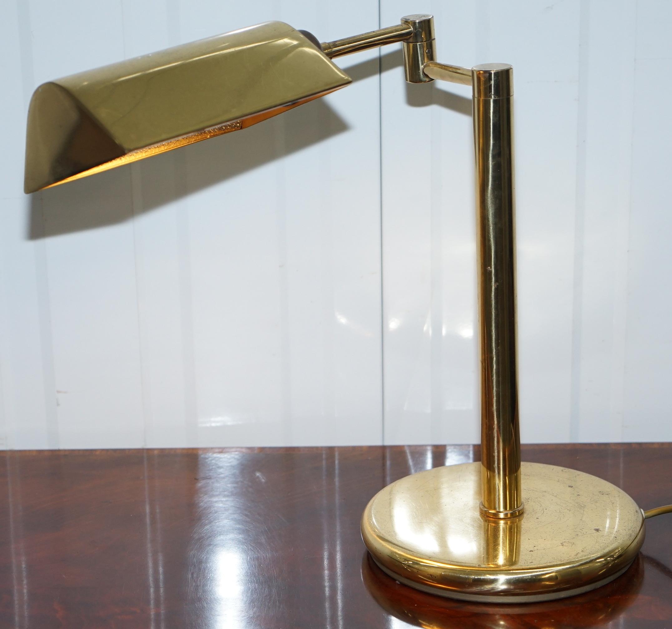 We are delighted to offer for sale this lovely made in England vintage Bankers lamp with adjustable arm and shade 

A nice piece with a genuine vintage patina to the brass, the shade turns and is fully adjustable, the arm is articulated and allows