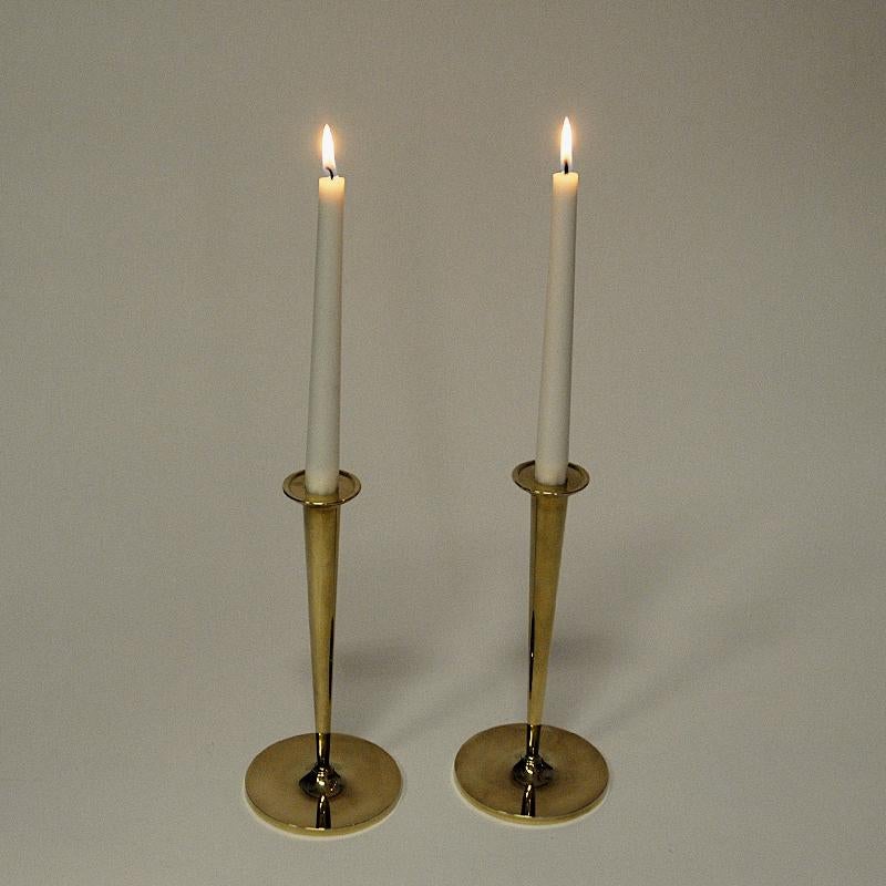 Lovely pair of mid-century brass candlestick holders by Swedish designer Arthur Pe, Kolbäck - Sweden 1960s. The candleholders are both beautiful, classic, unique and stunning on your table, window, kitchen island etc. Marked underneath with label