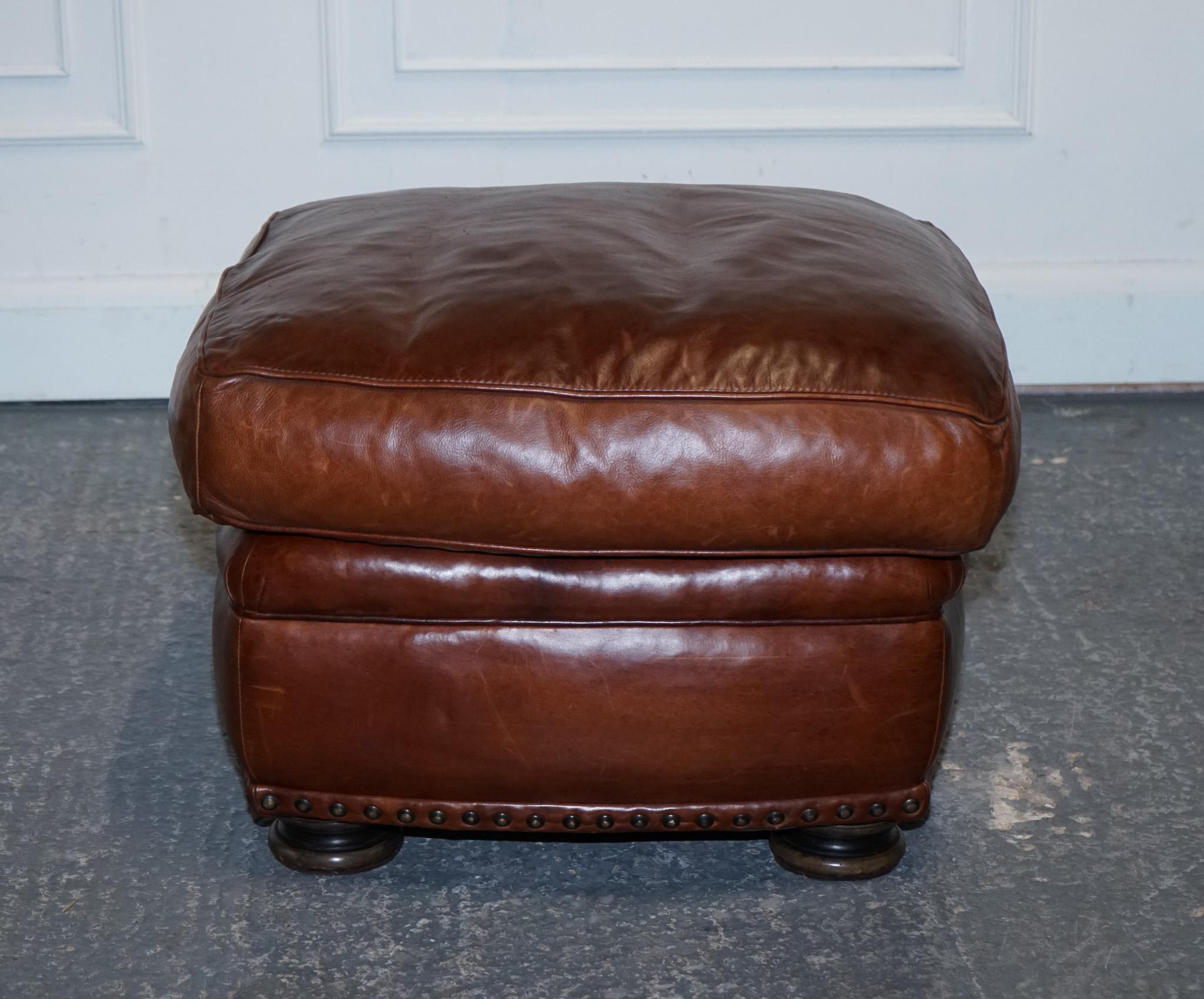 LOVELY VINTAGE BROWN LEATHER FOOTSTOOL FEATHER FILLED BRASS STUDS DETAiL For Sale 7