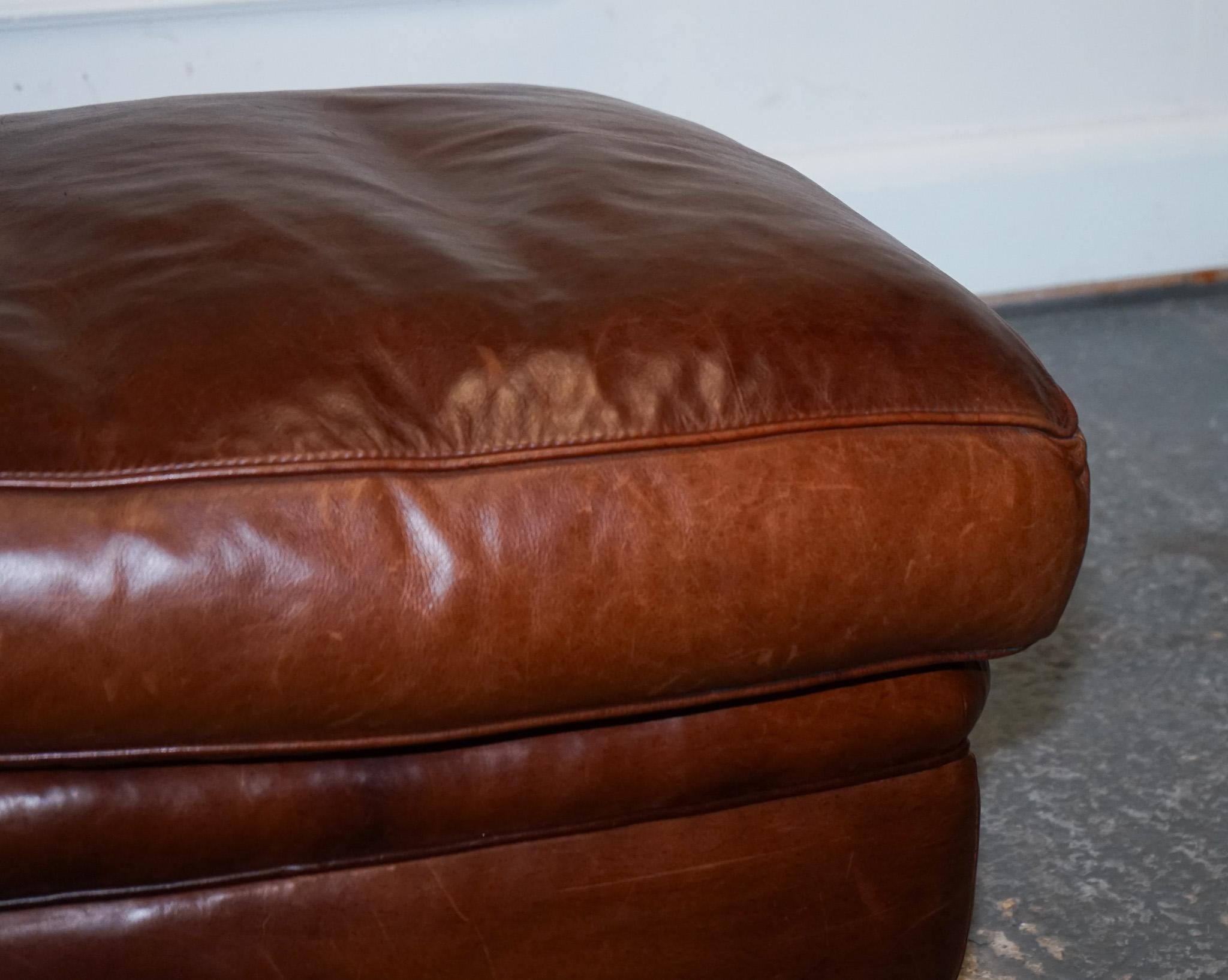 British LOVELY VINTAGE BROWN LEATHER FOOTSTOOL FEATHER FILLED BRASS STUDS DETAiL For Sale