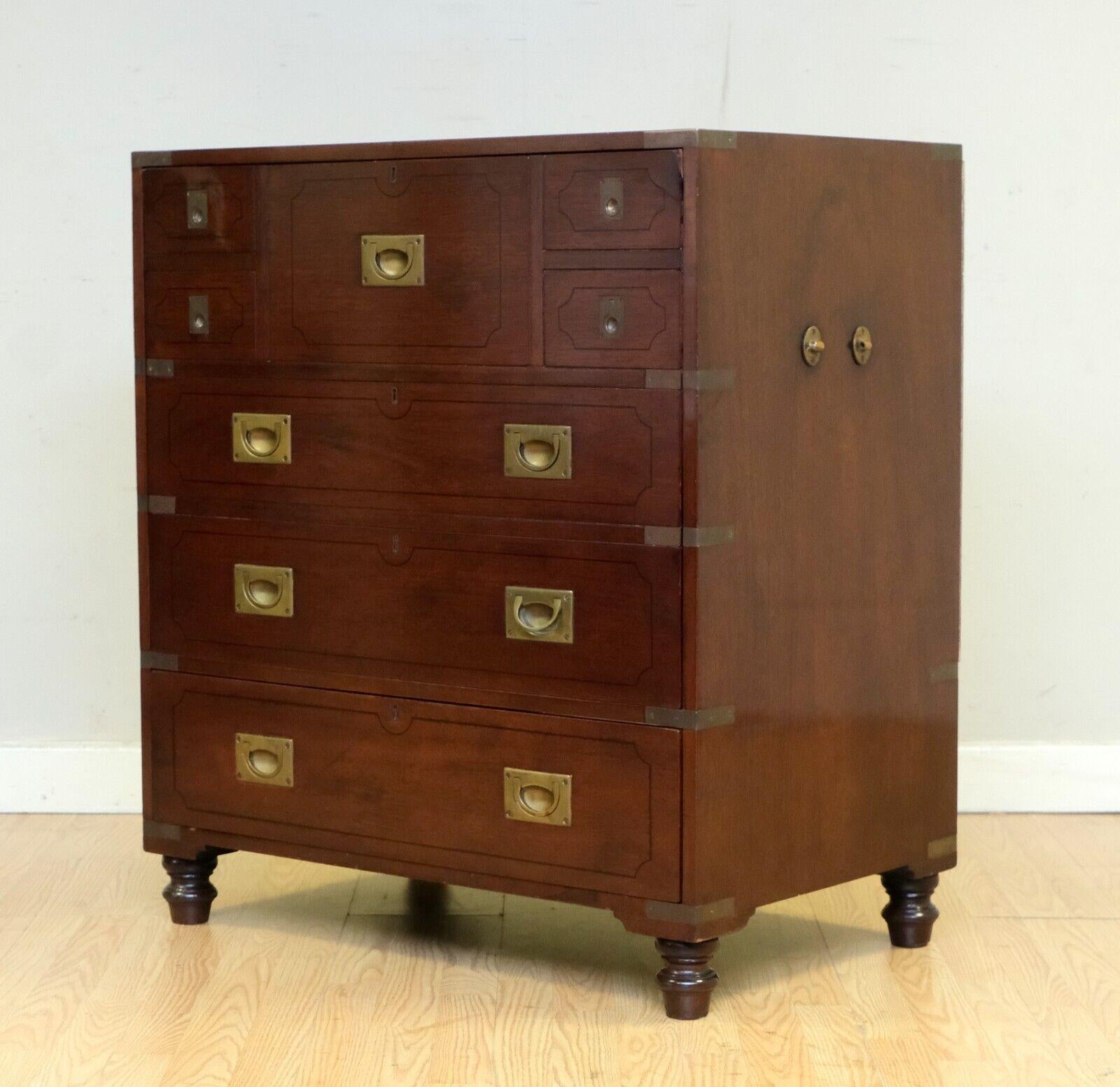 We are delighted to offer for sale this lovely military campaign, mahogany cabinet with false drawers and one real drawer.

This aesthetically attractive and well made cabinet is presented with a unique, functioning, sliding door (you first pull out