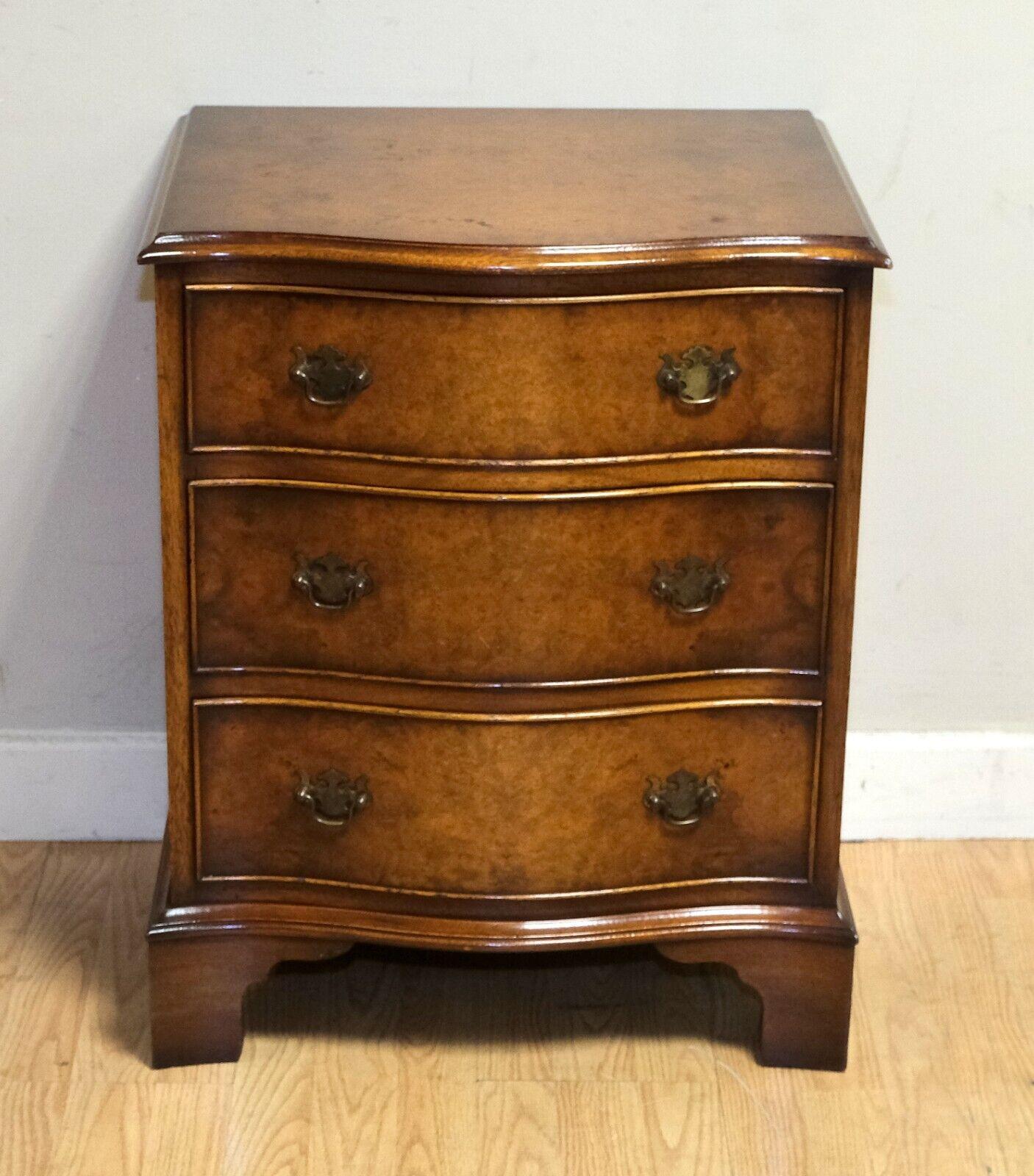 We are delighted to offer for sale this lovely 1960s Bevan Funell Burr Walnut serpentine fronted chest of drawers.

This good looking and well made piece is from the well known, English furniture makers, Bevan Funnell, it shows quality of the